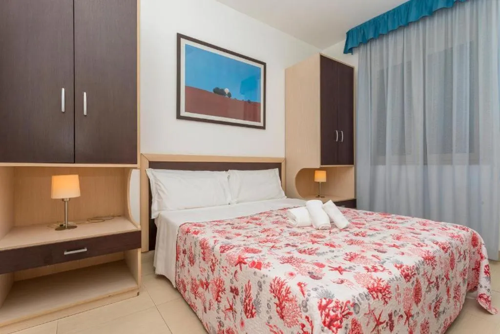 Bed in Sirina House Taormina