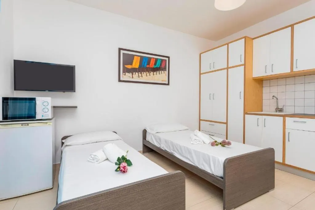 Bed in Sirina House Taormina