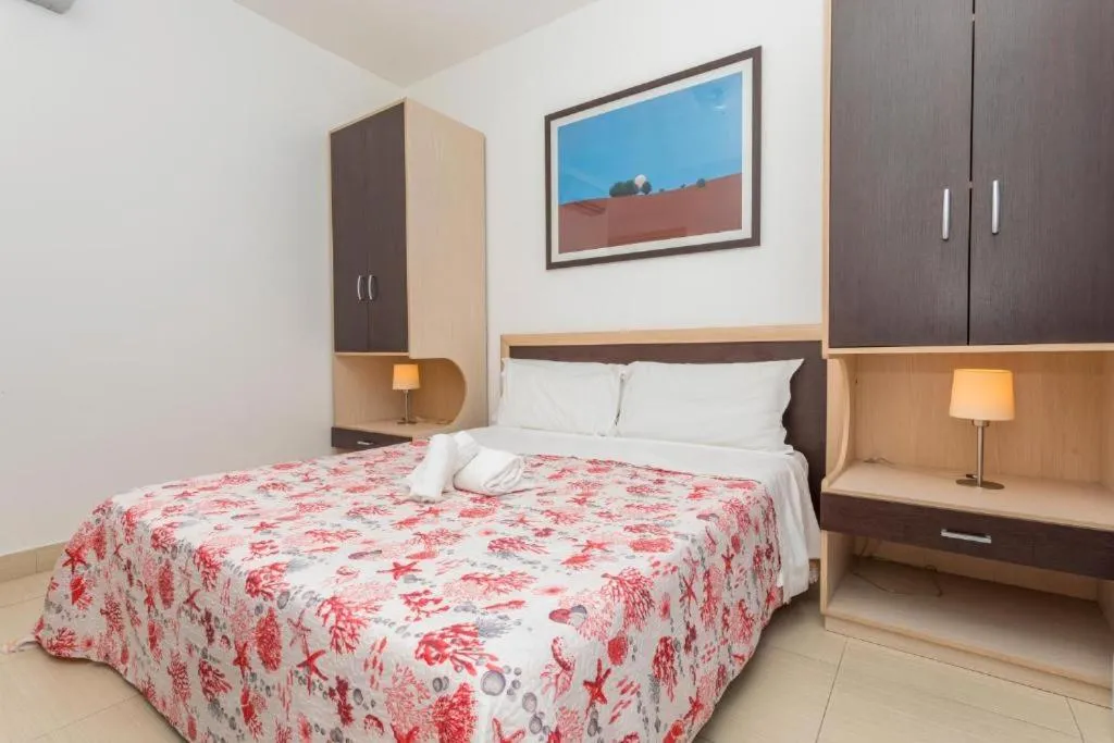 Bed in Sirina House Taormina