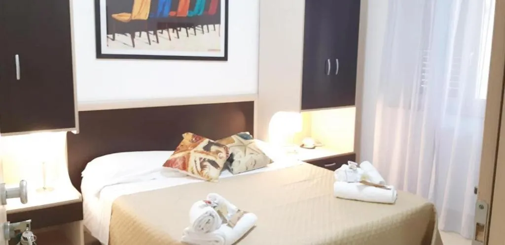 Bed in Sirina House Taormina