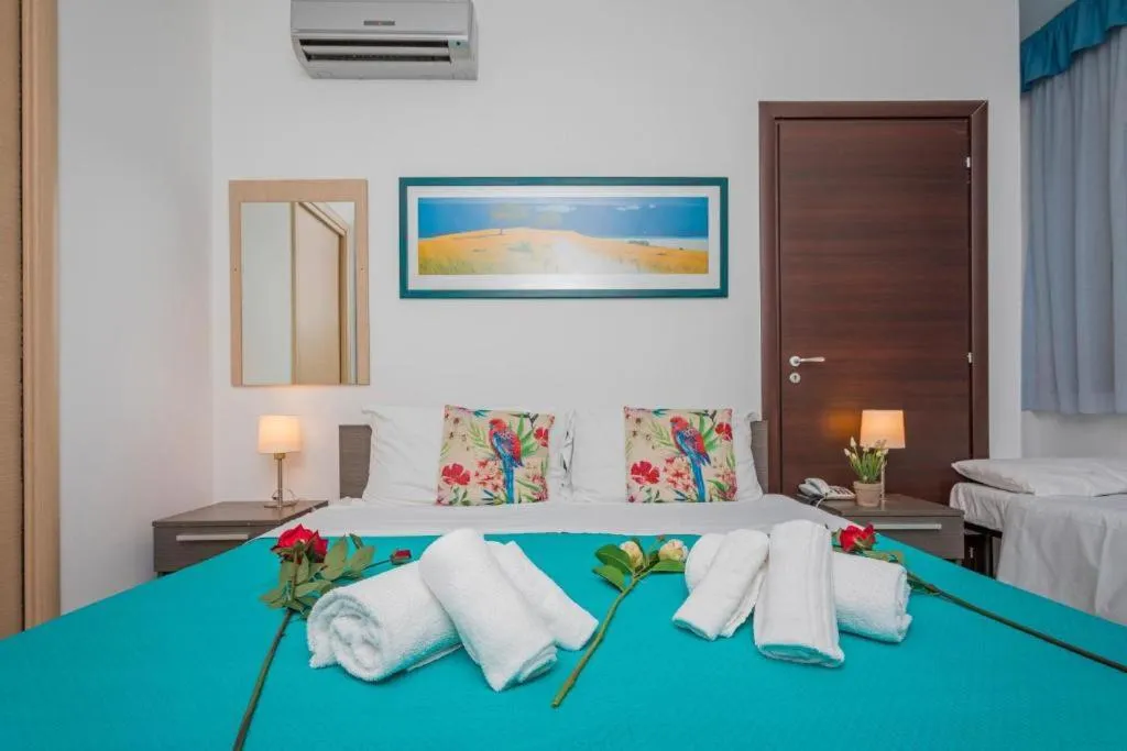 Bed in Sirina House Taormina