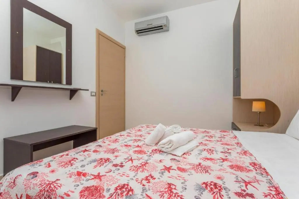 Bed in Sirina House Taormina