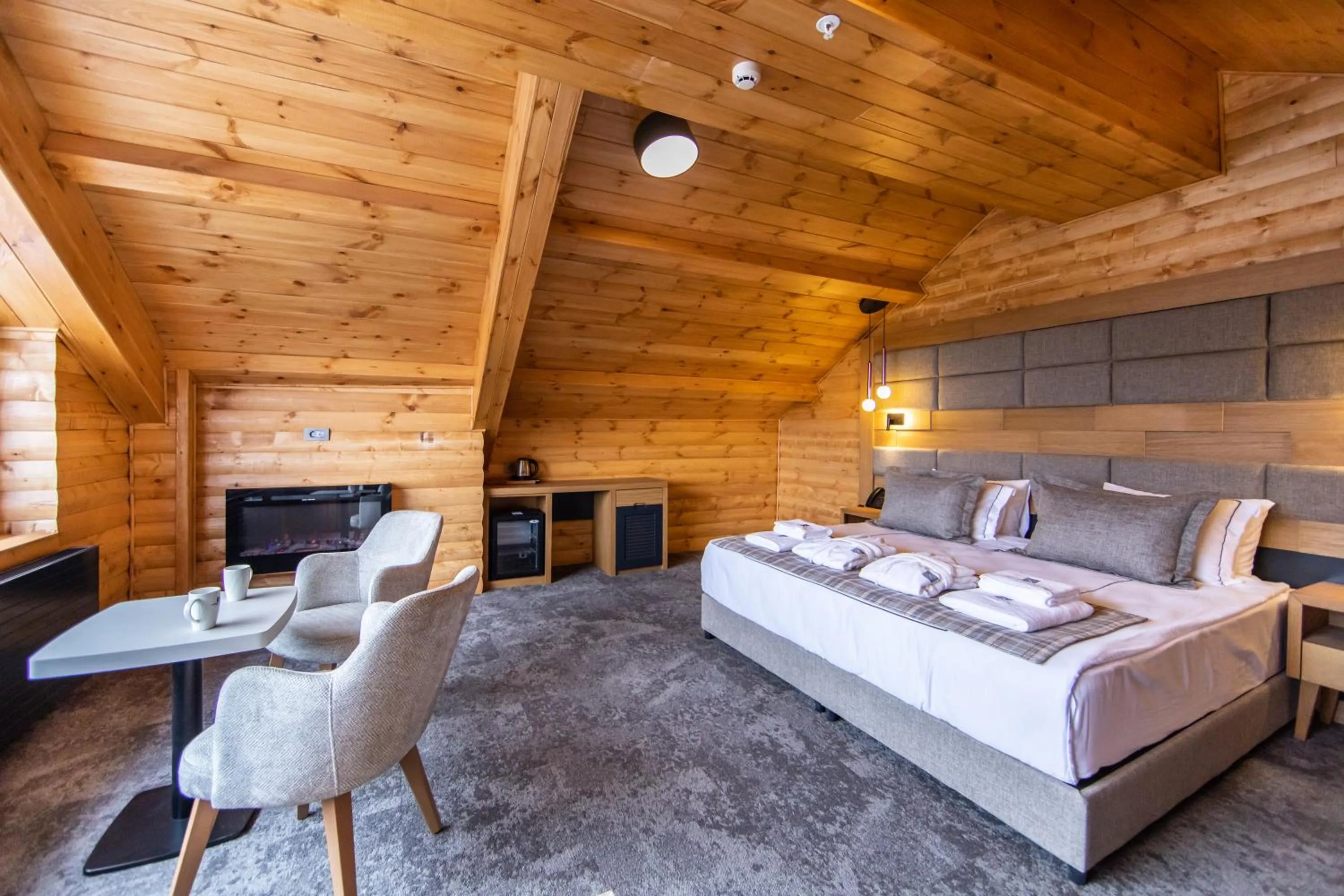 Bed in SARPİNO MOUNTAİN HOTEL