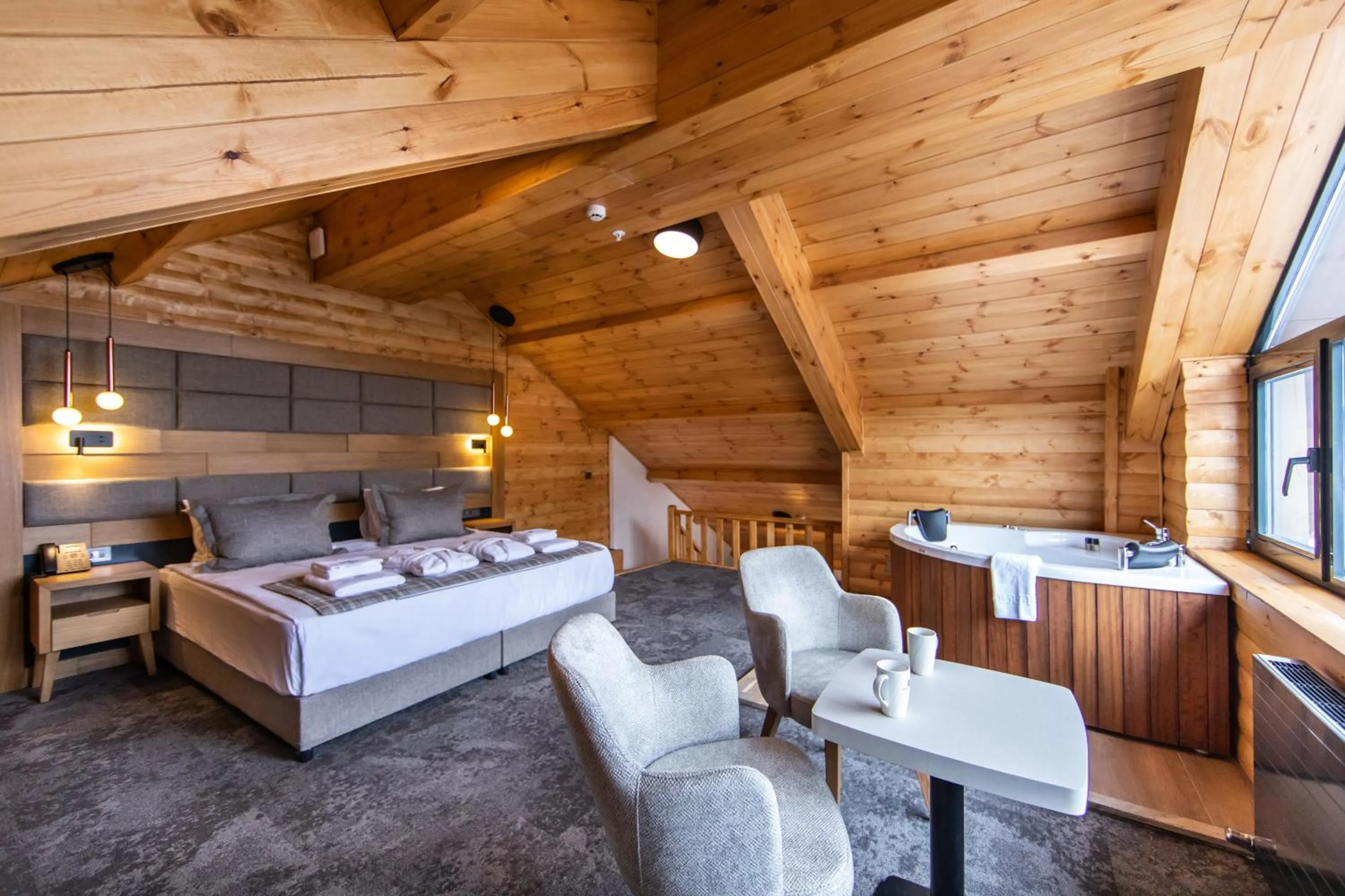 Seating area, Bed in SARPİNO MOUNTAİN HOTEL