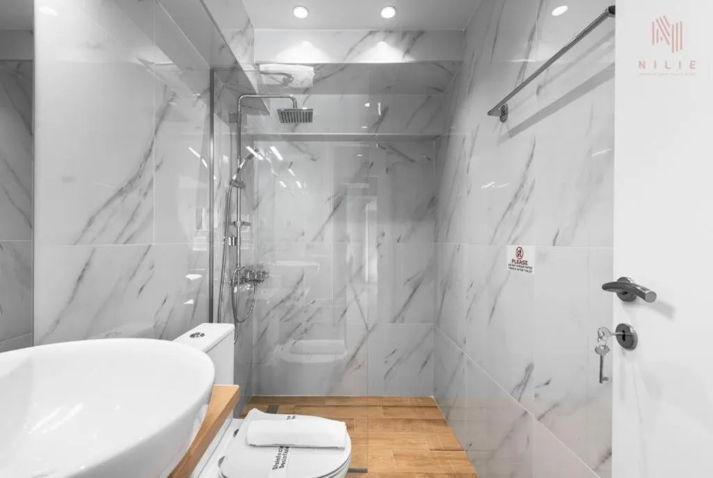 Shower in Big Apple, Nilie Hospitality MGMT