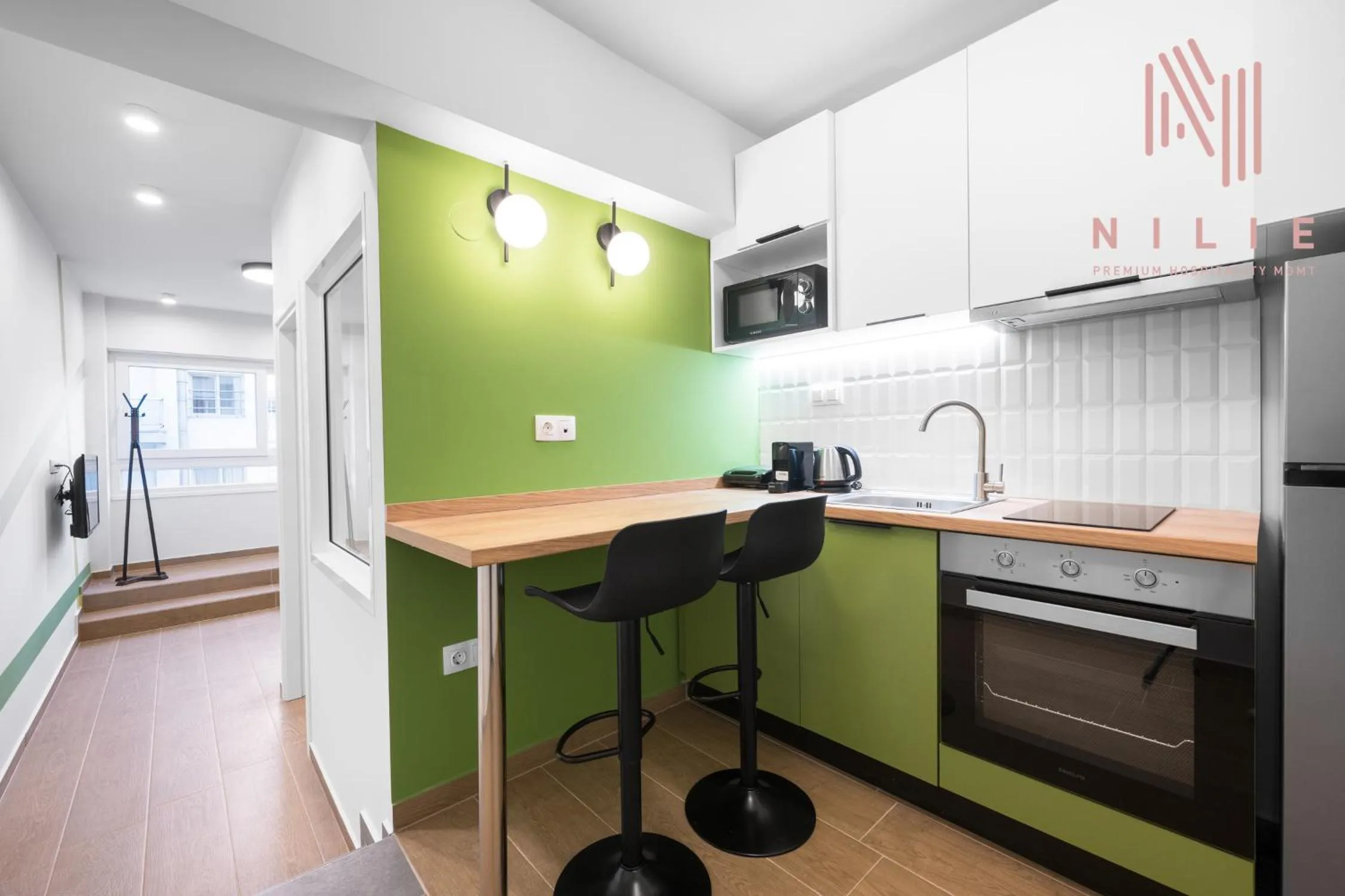 Kitchen or kitchenette in Big Apple, Nilie Hospitality MGMT