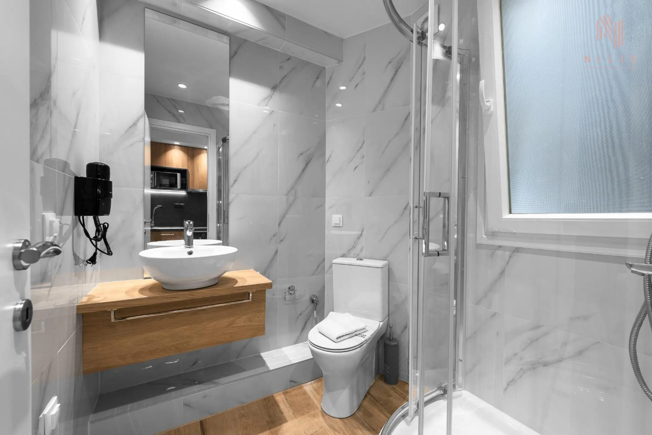 Shower in Big Apple, Nilie Hospitality MGMT