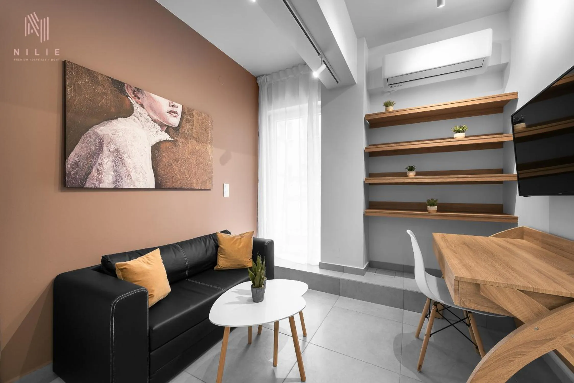 Living room in Big Apple, Nilie Hospitality MGMT