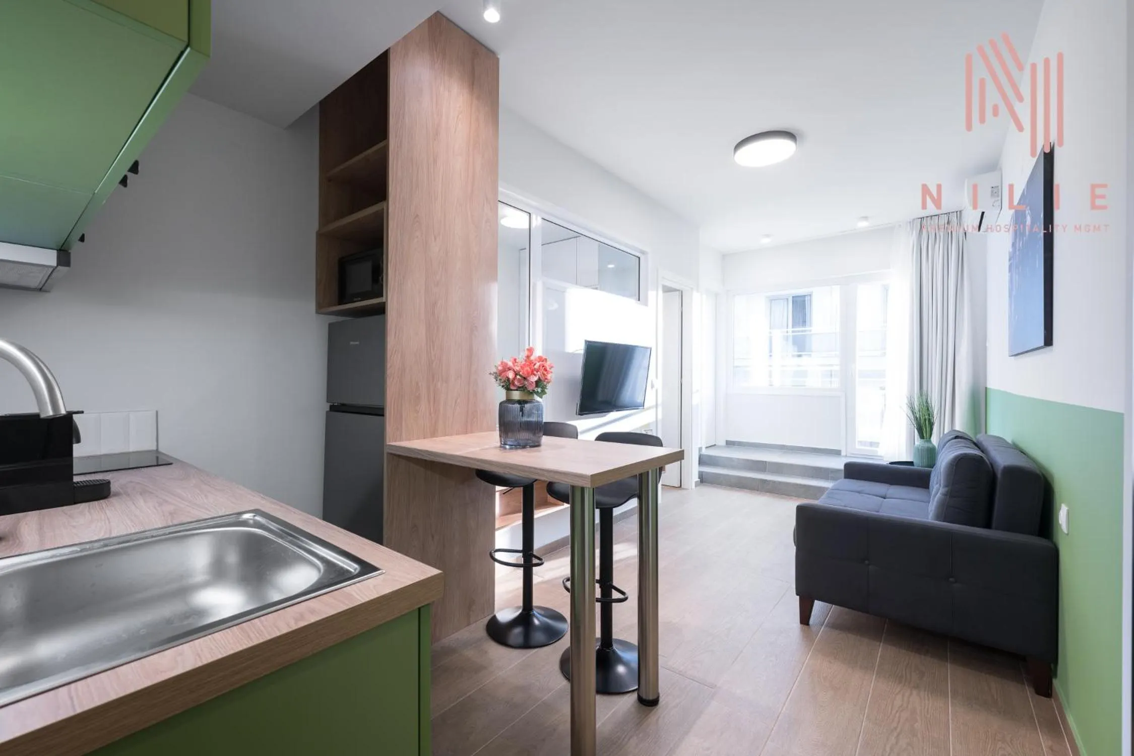 Kitchen or kitchenette in Big Apple, Nilie Hospitality MGMT