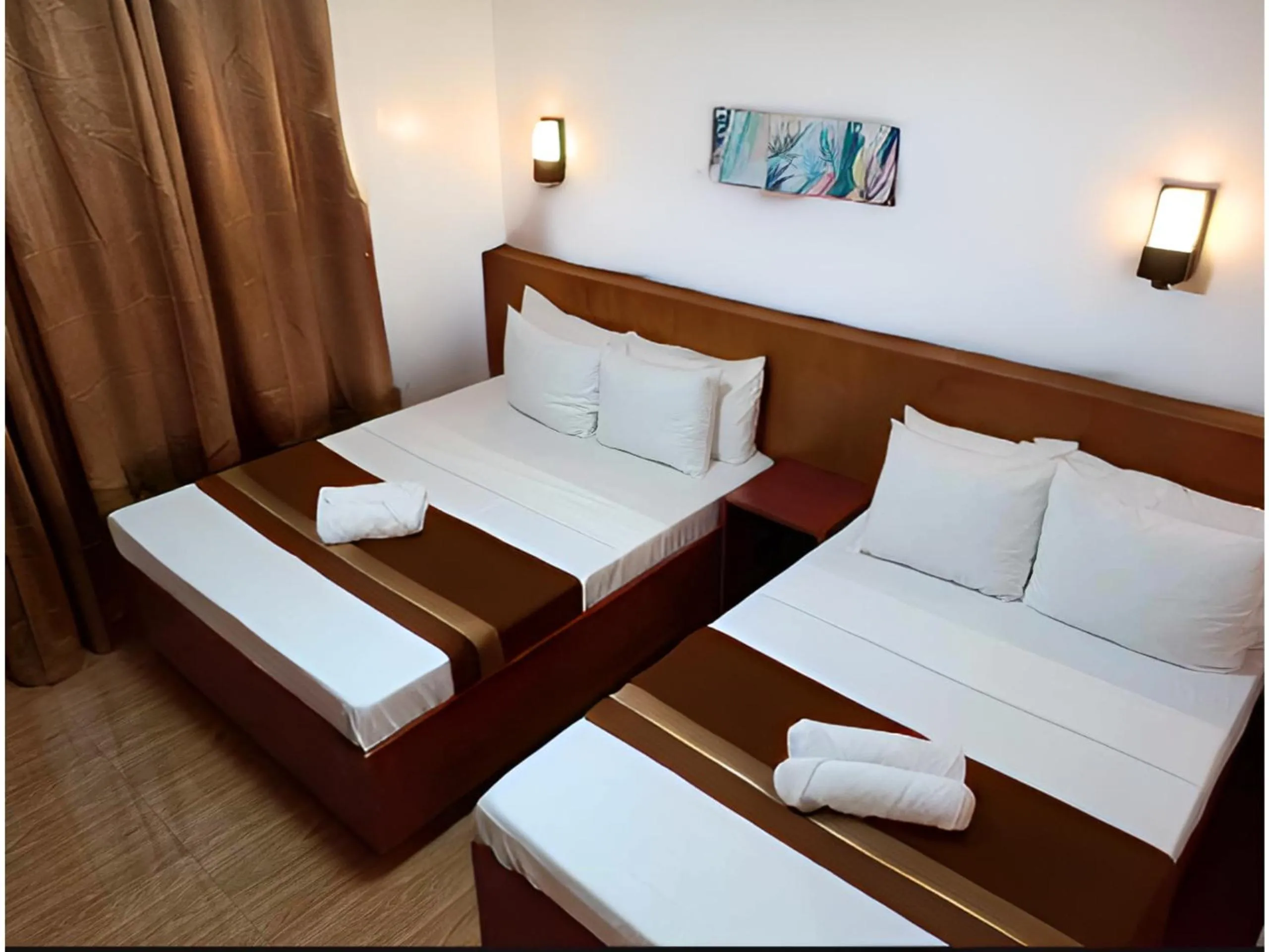 Bed in Dy Heritage Suites