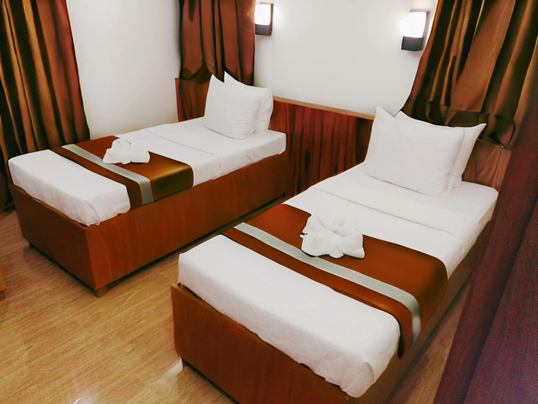 Bed in Dy Heritage Suites