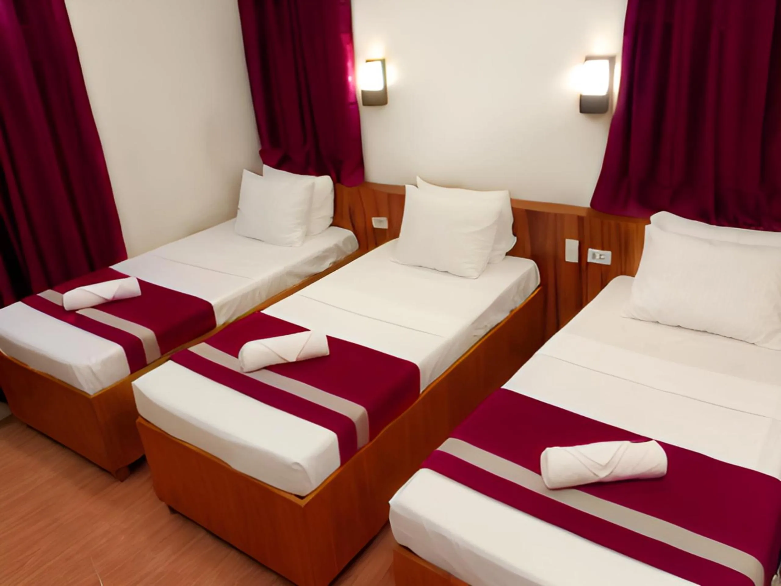 Bed in Dy Heritage Suites