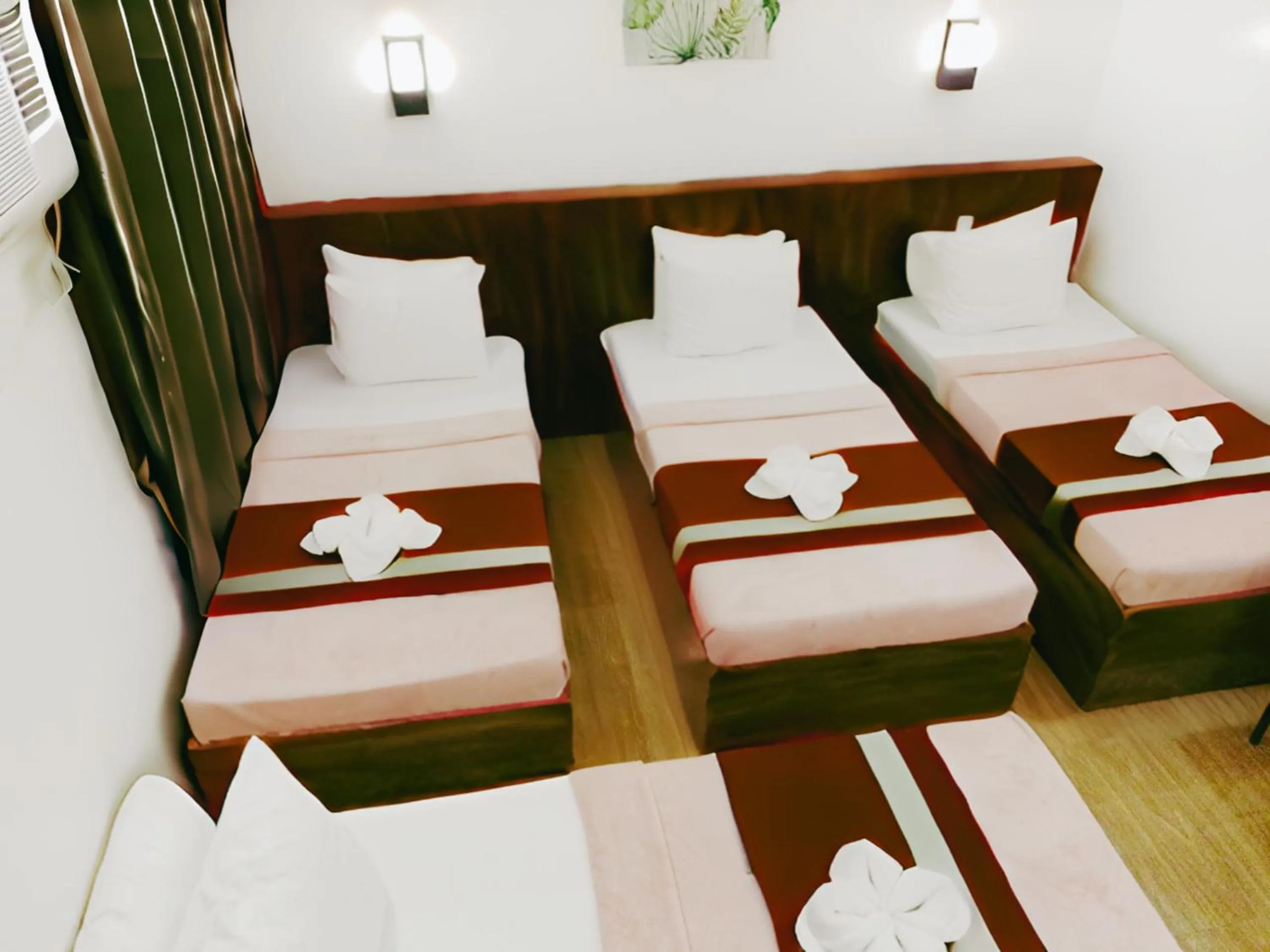 Bed in Dy Heritage Suites