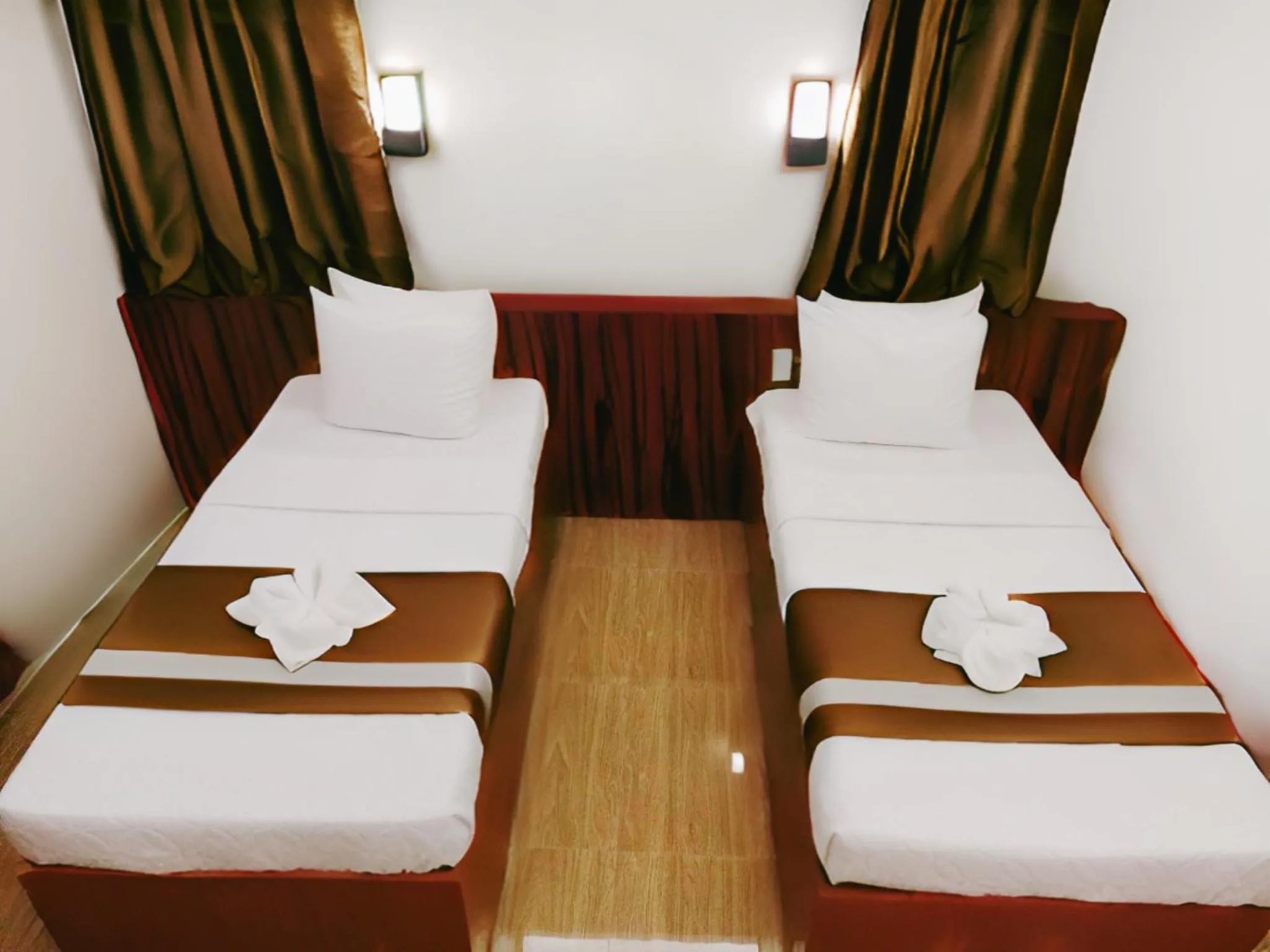 Bed in Dy Heritage Suites