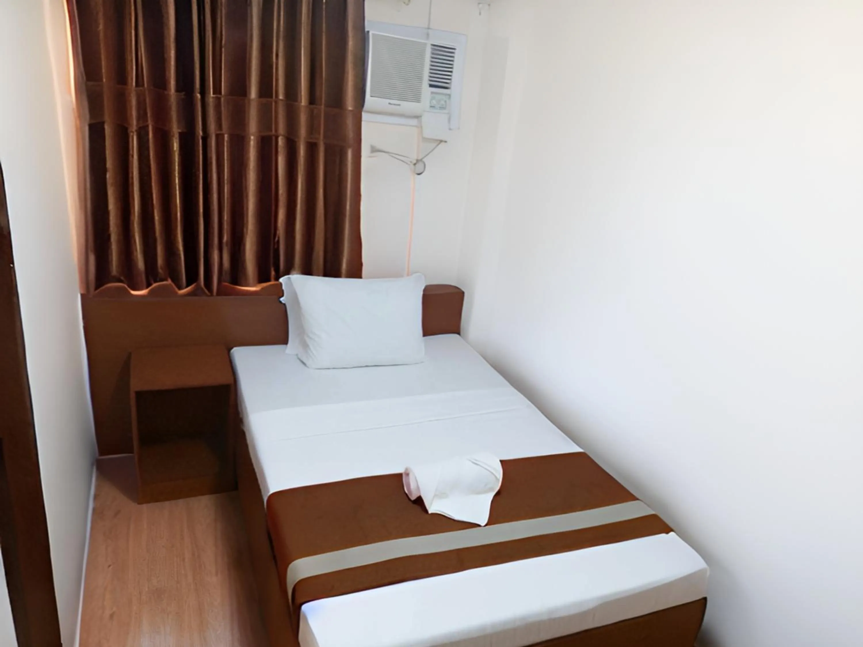 Bed in Dy Heritage Suites