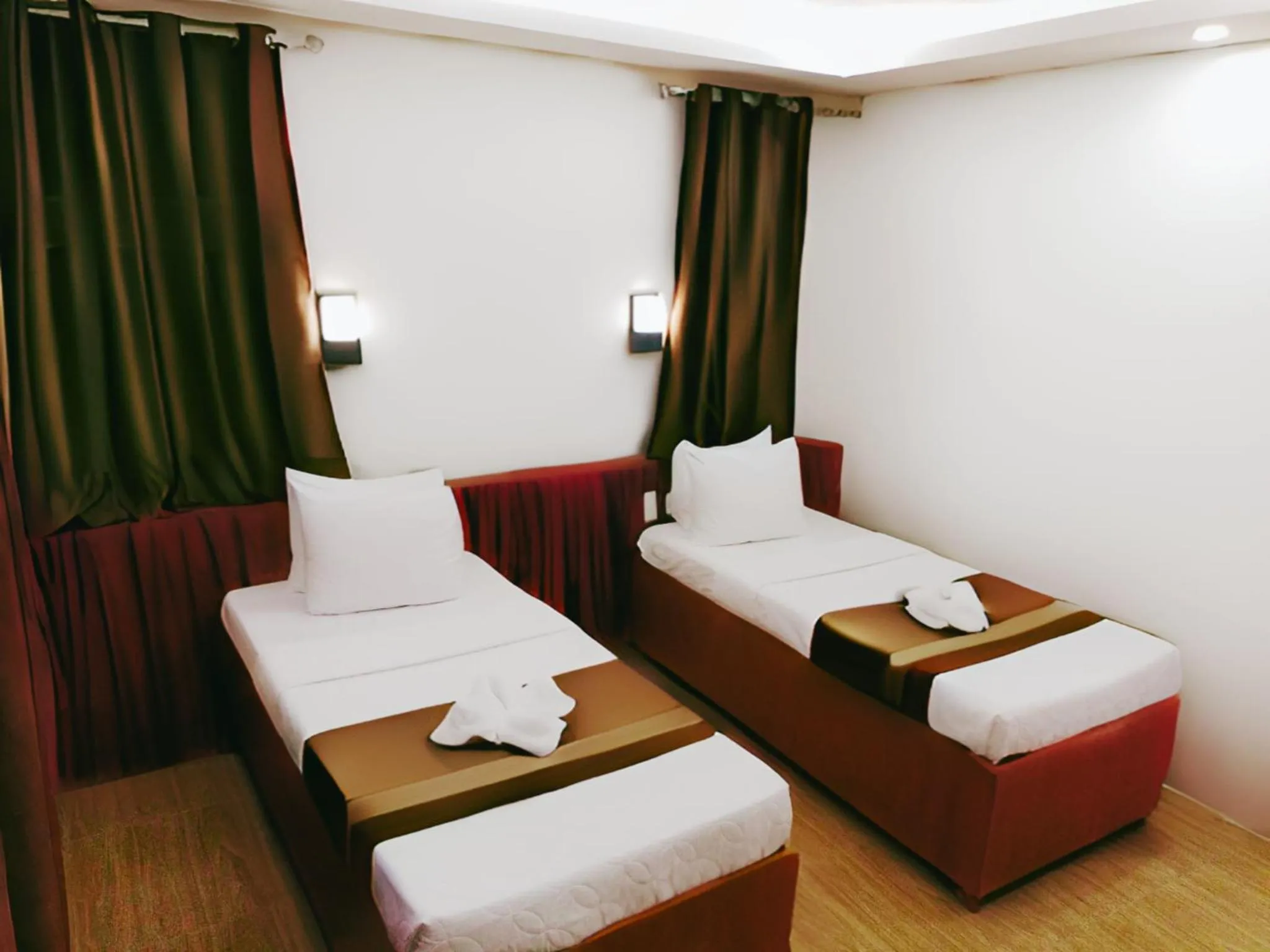 Bed in Dy Heritage Suites