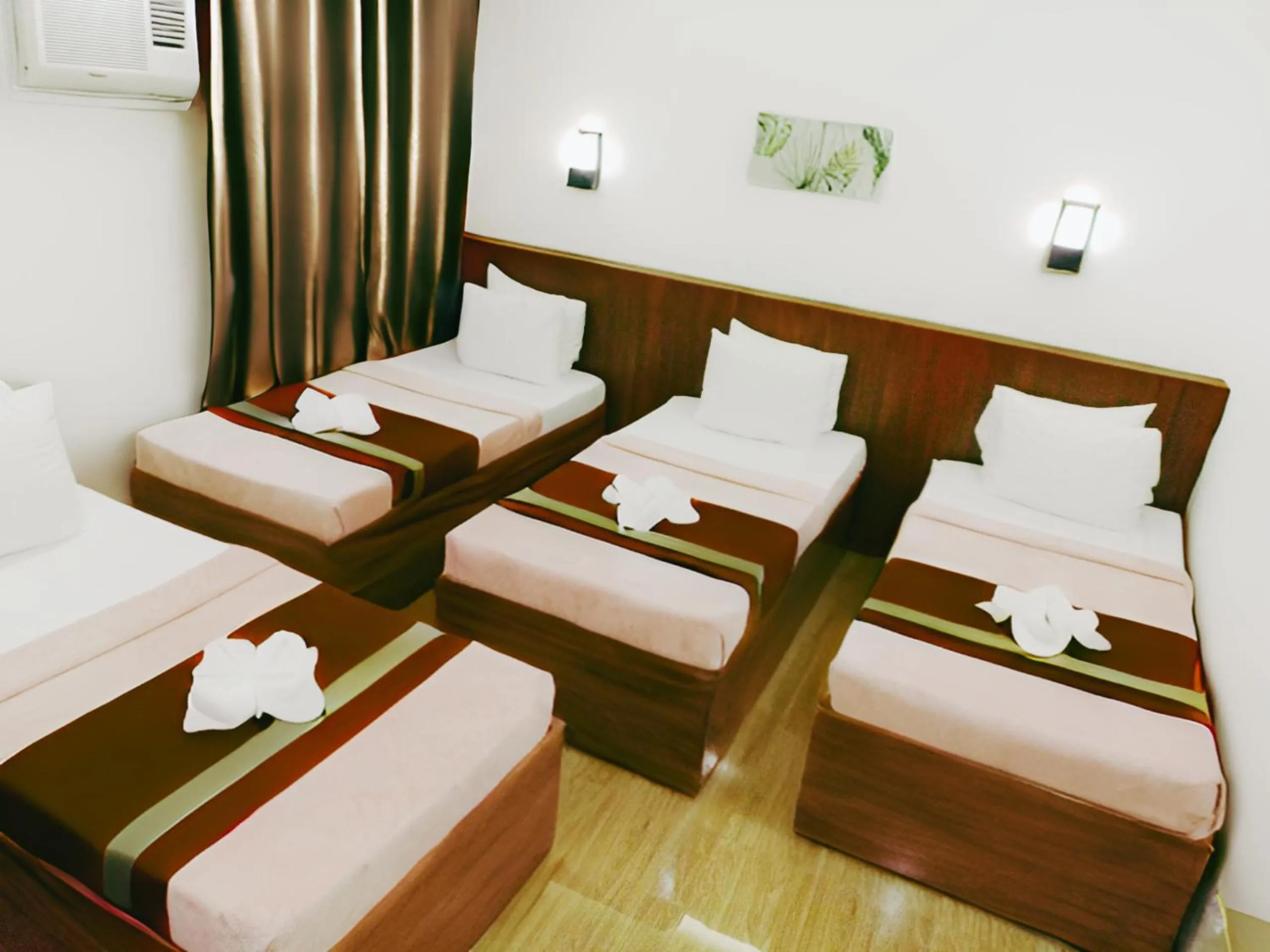 Bed in Dy Heritage Suites