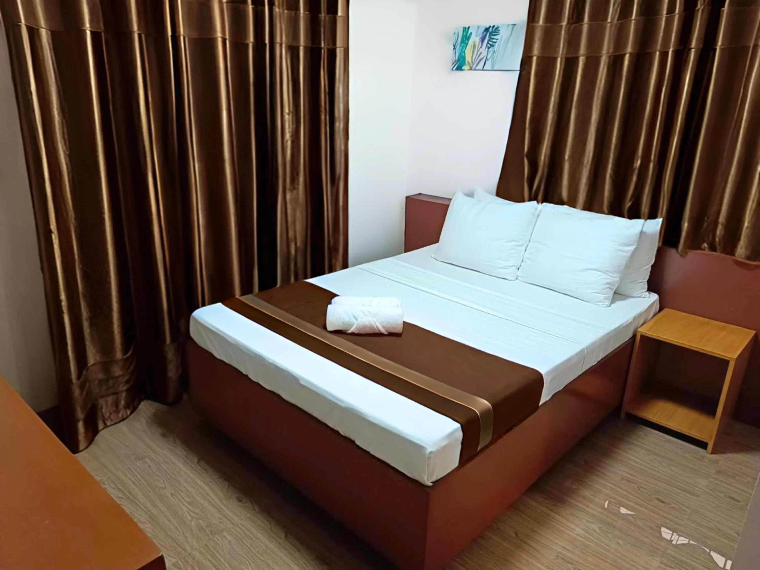 Bed in Dy Heritage Suites