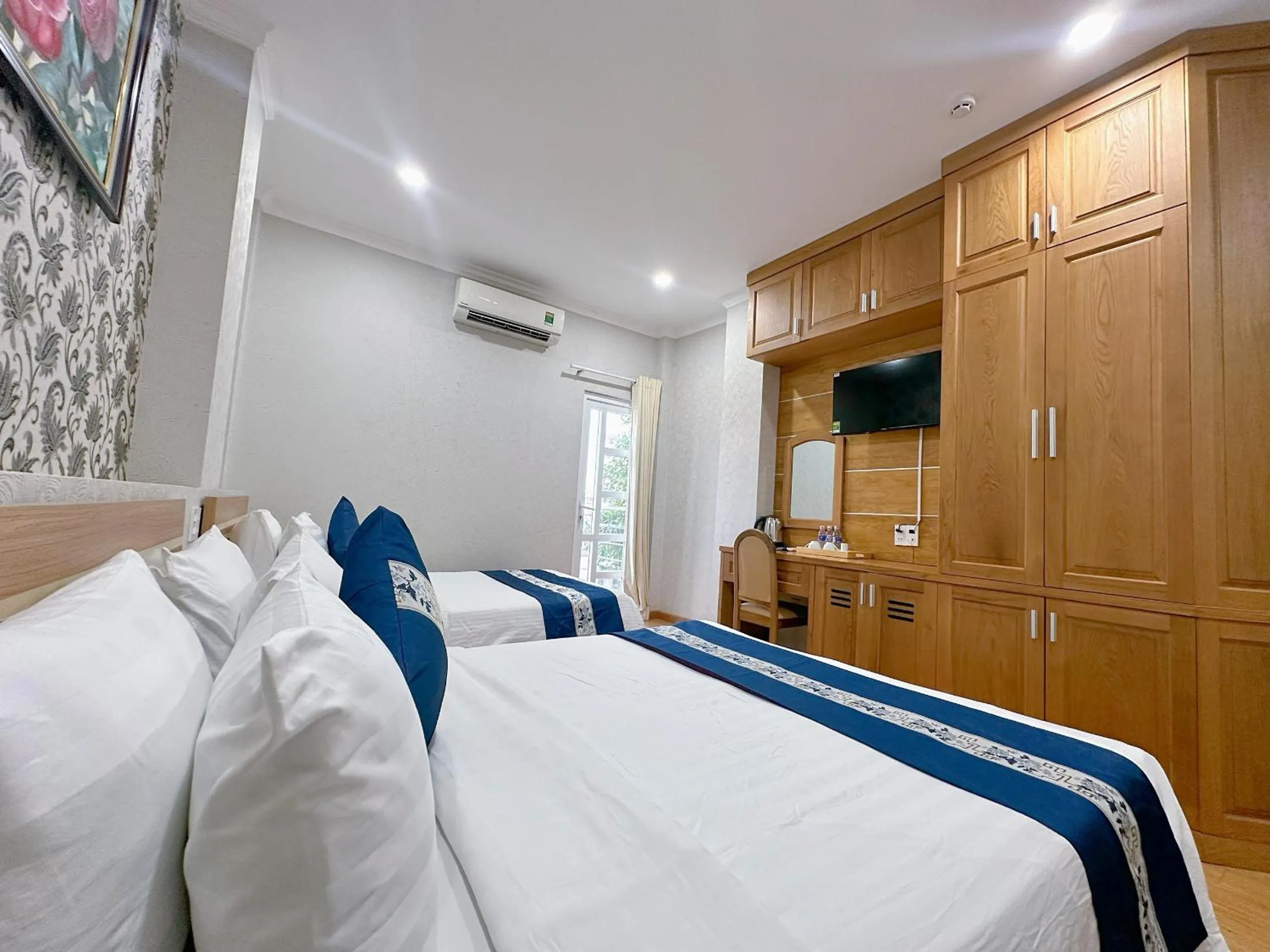 Property building, Bed in Tra My Hotel - SaiGon Center