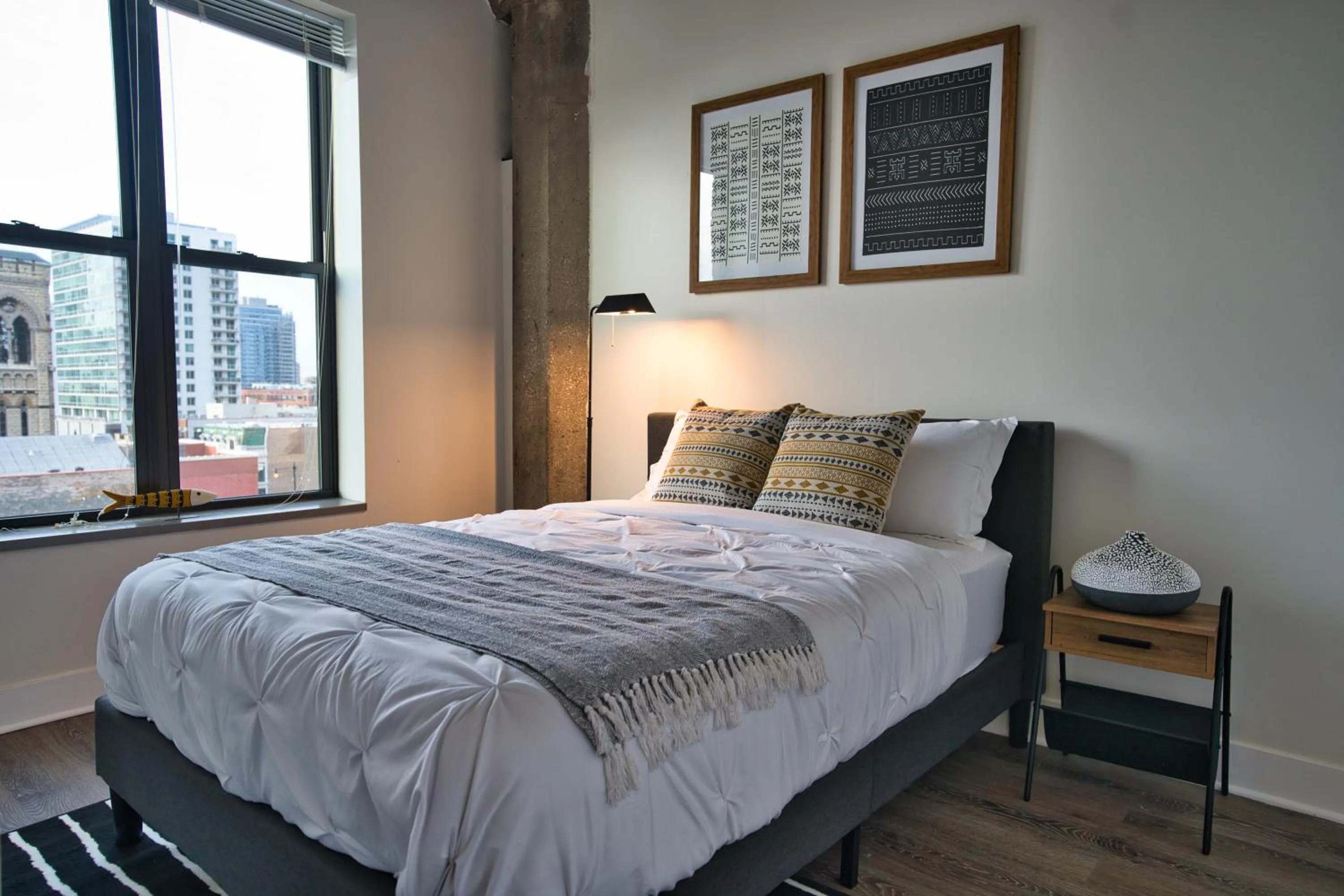 Bed in South Loop 2BR Getaway with Smart TVs & Optional Parking Near McCormick Place, Museum Campus & Downtown