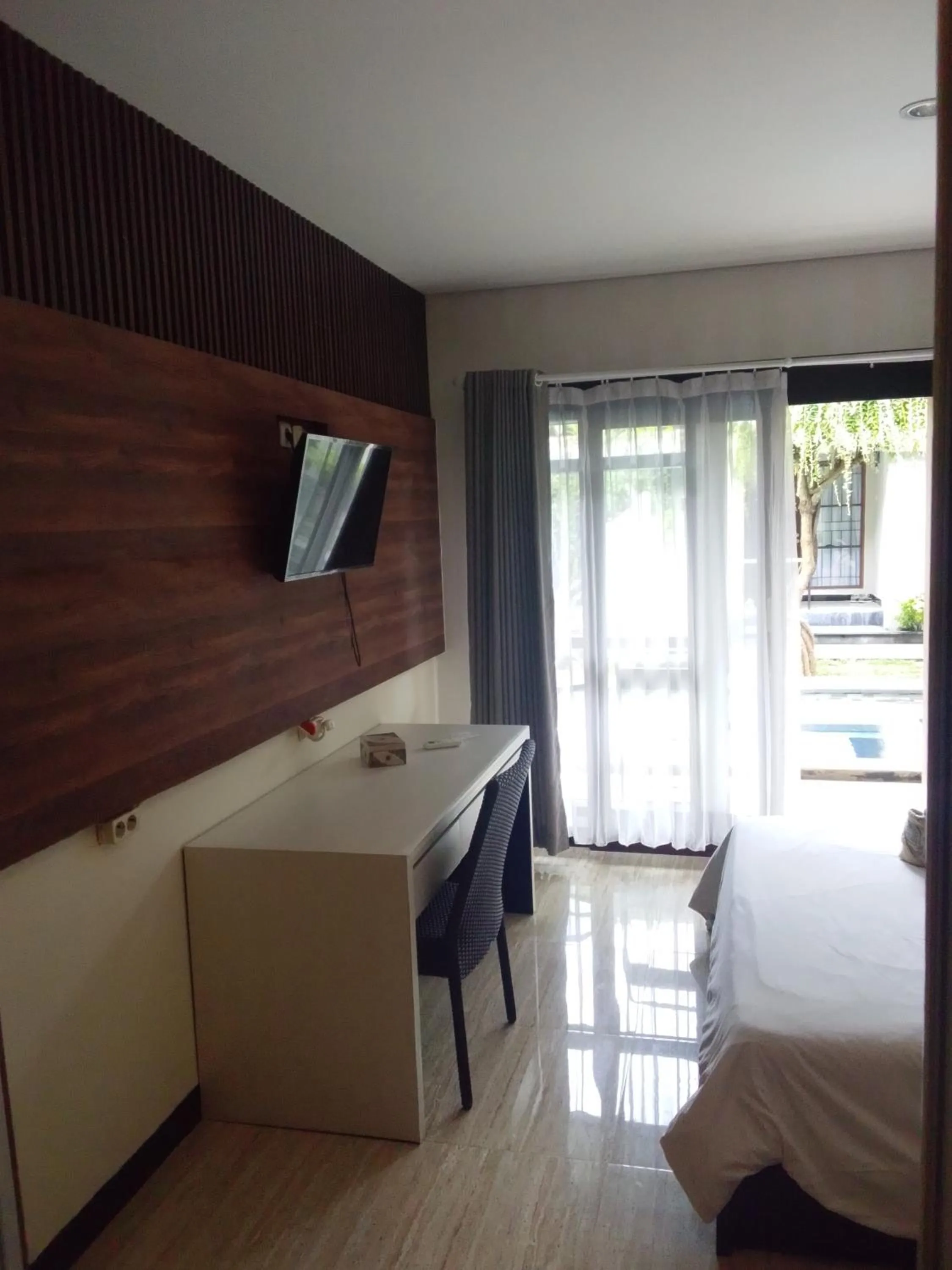 Bed in NEW KUBU DI BUKIT apartemen & motor bike rental near beach and 10 minute to airpot
