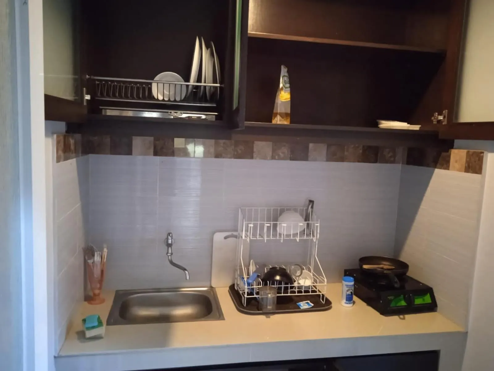 Kitchen or kitchenette in NEW KUBU DI BUKIT apartemen & motor bike rental near beach and 10 minute to airpot