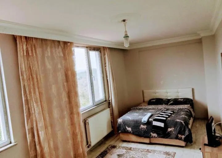 Bed in Ahmet teacher's villa, 6 minutes from the airport