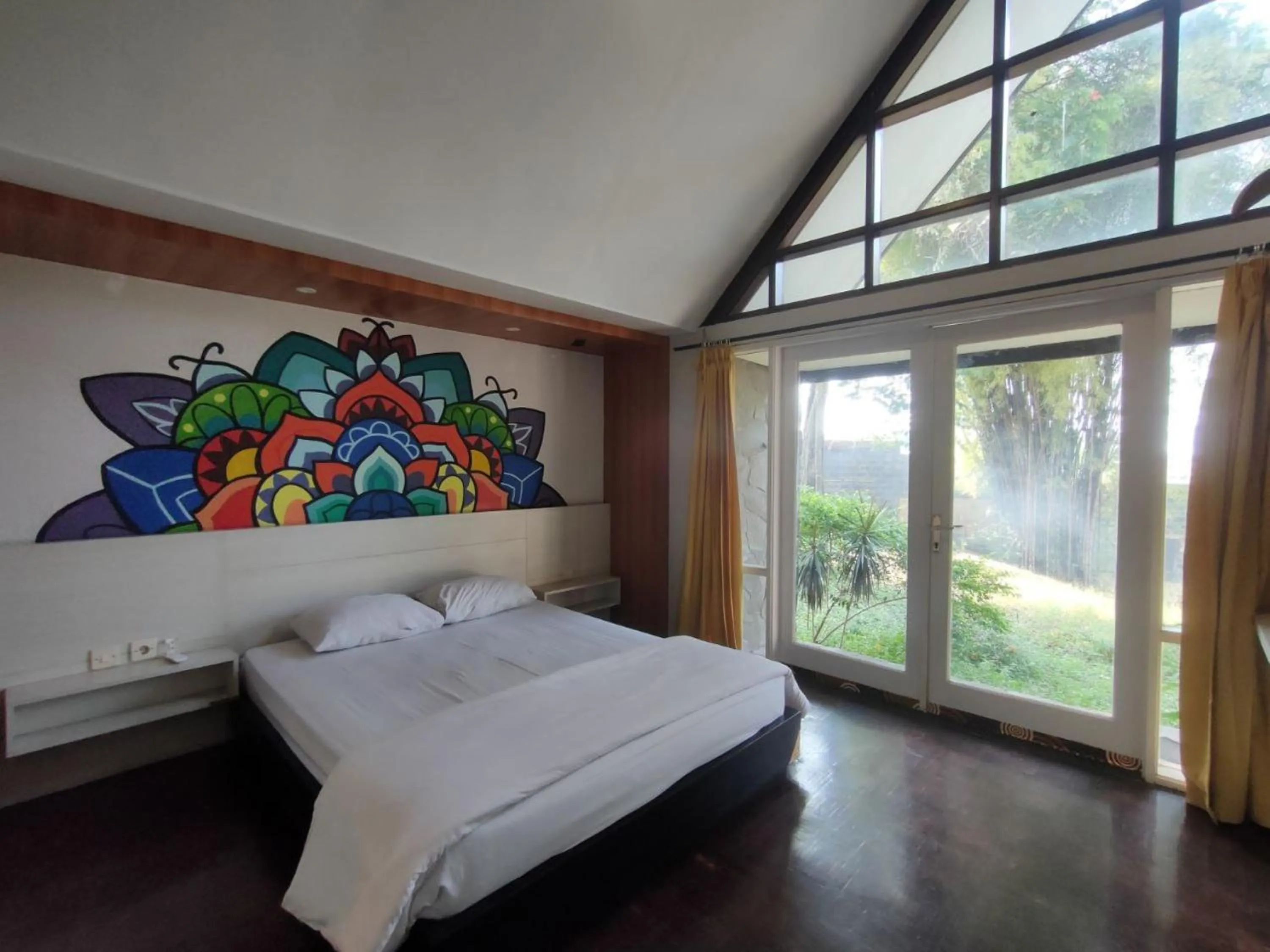Bed in Grand Mulia Sakinah Boutique Resort Pandaan