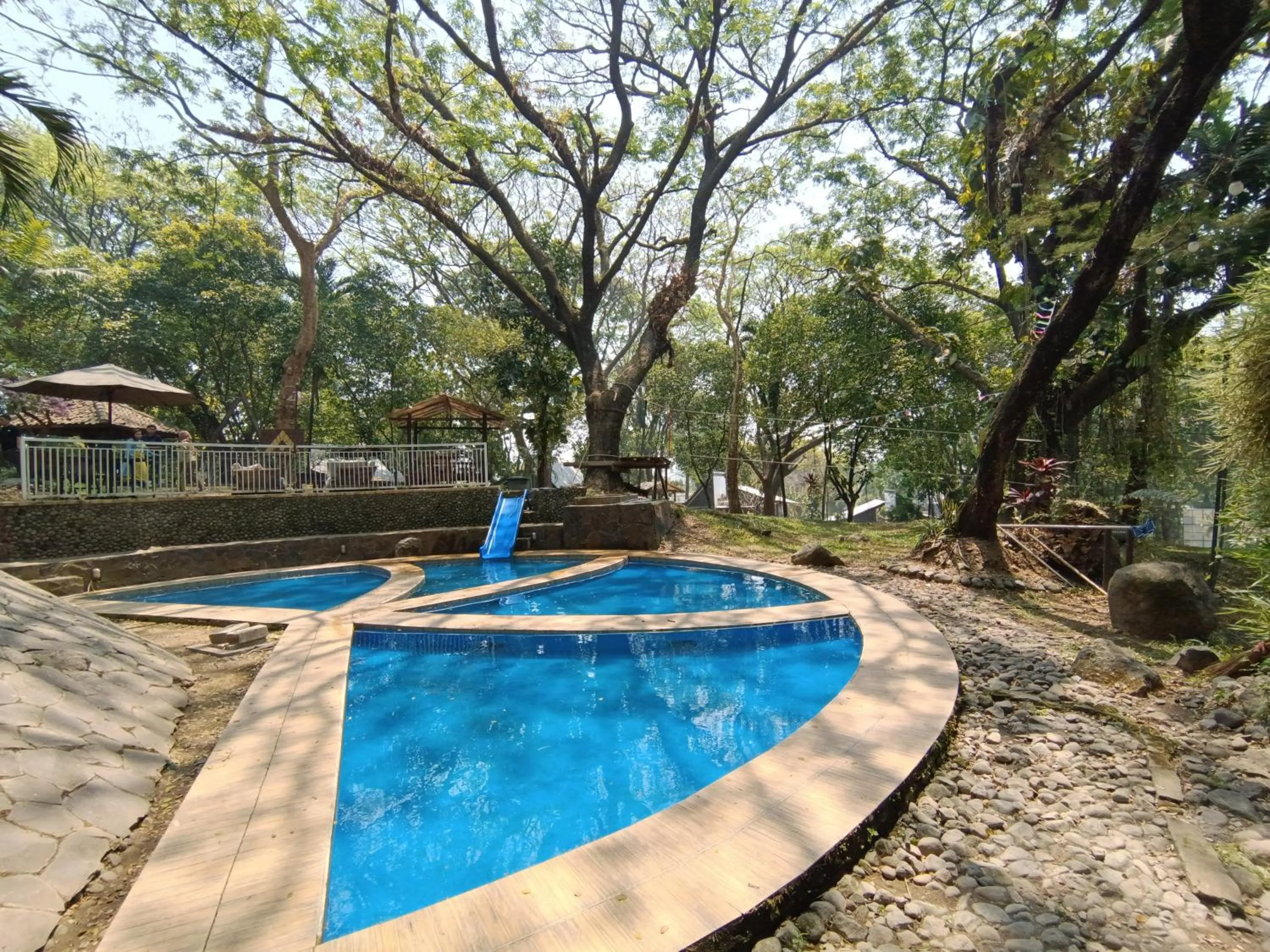 Swimming pool in Grand Mulia Sakinah Boutique Resort Pandaan