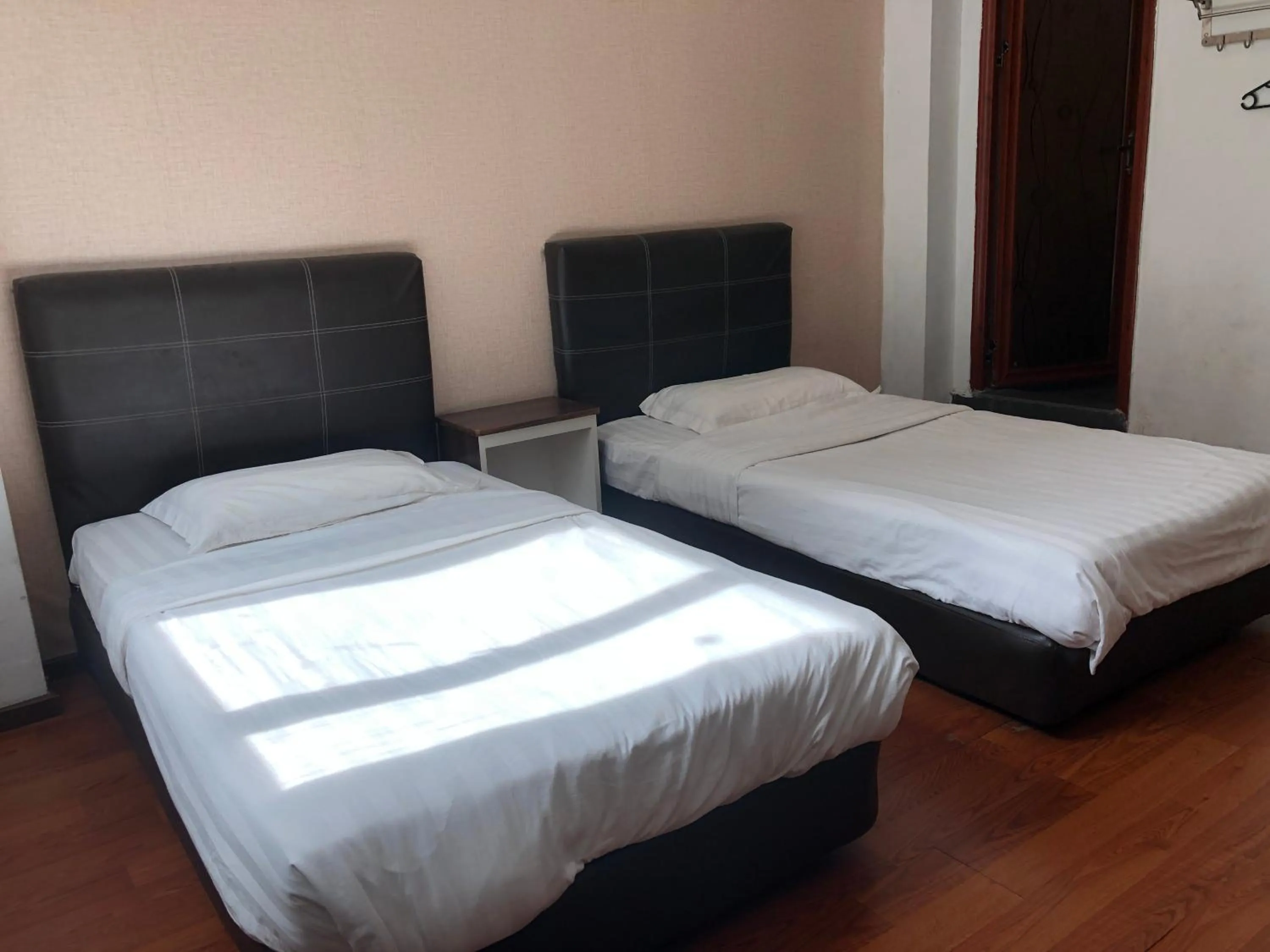 Bedroom in Super OYO 90668 Joy Inn