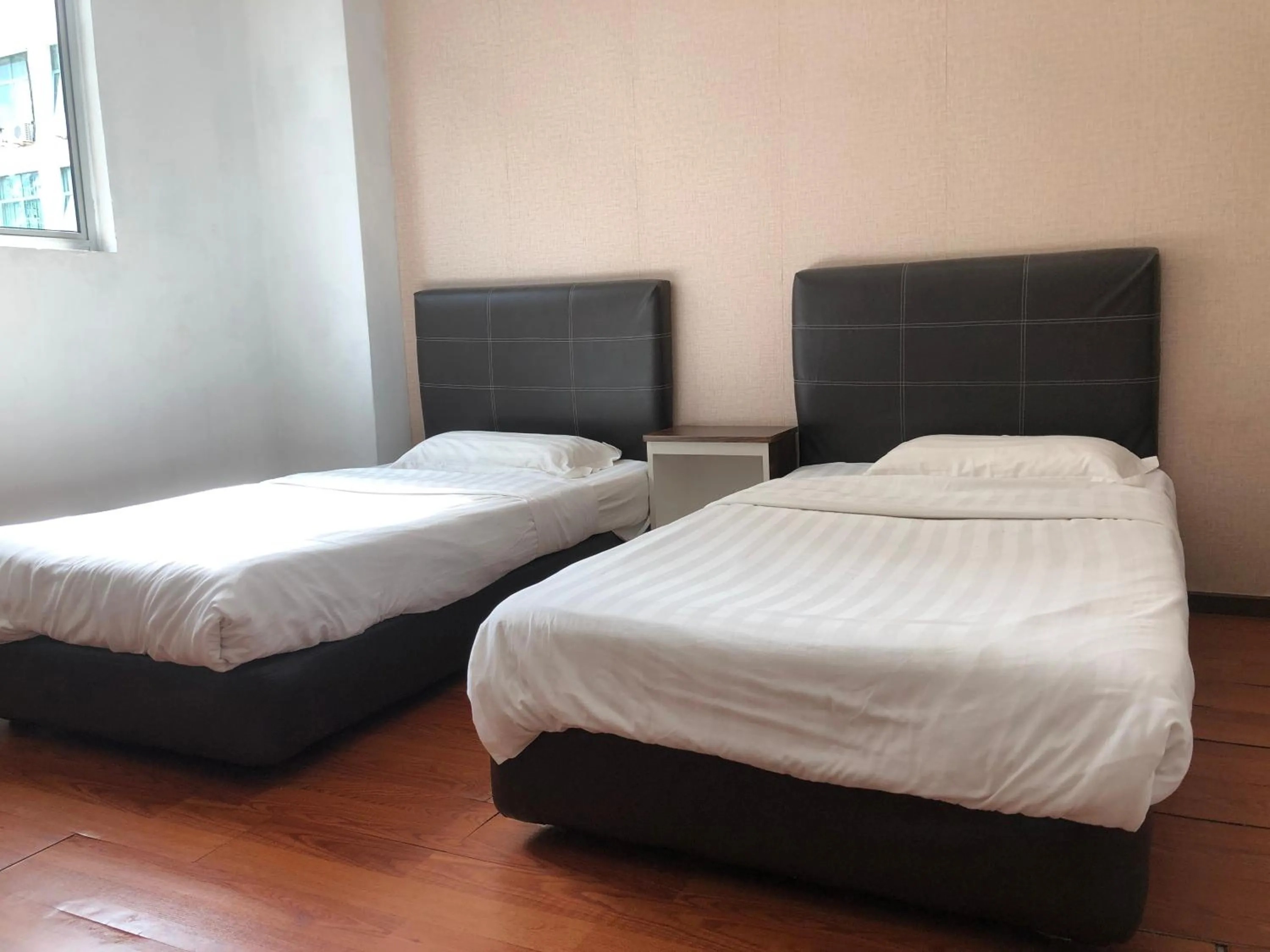 Bedroom in Super OYO 90668 Joy Inn