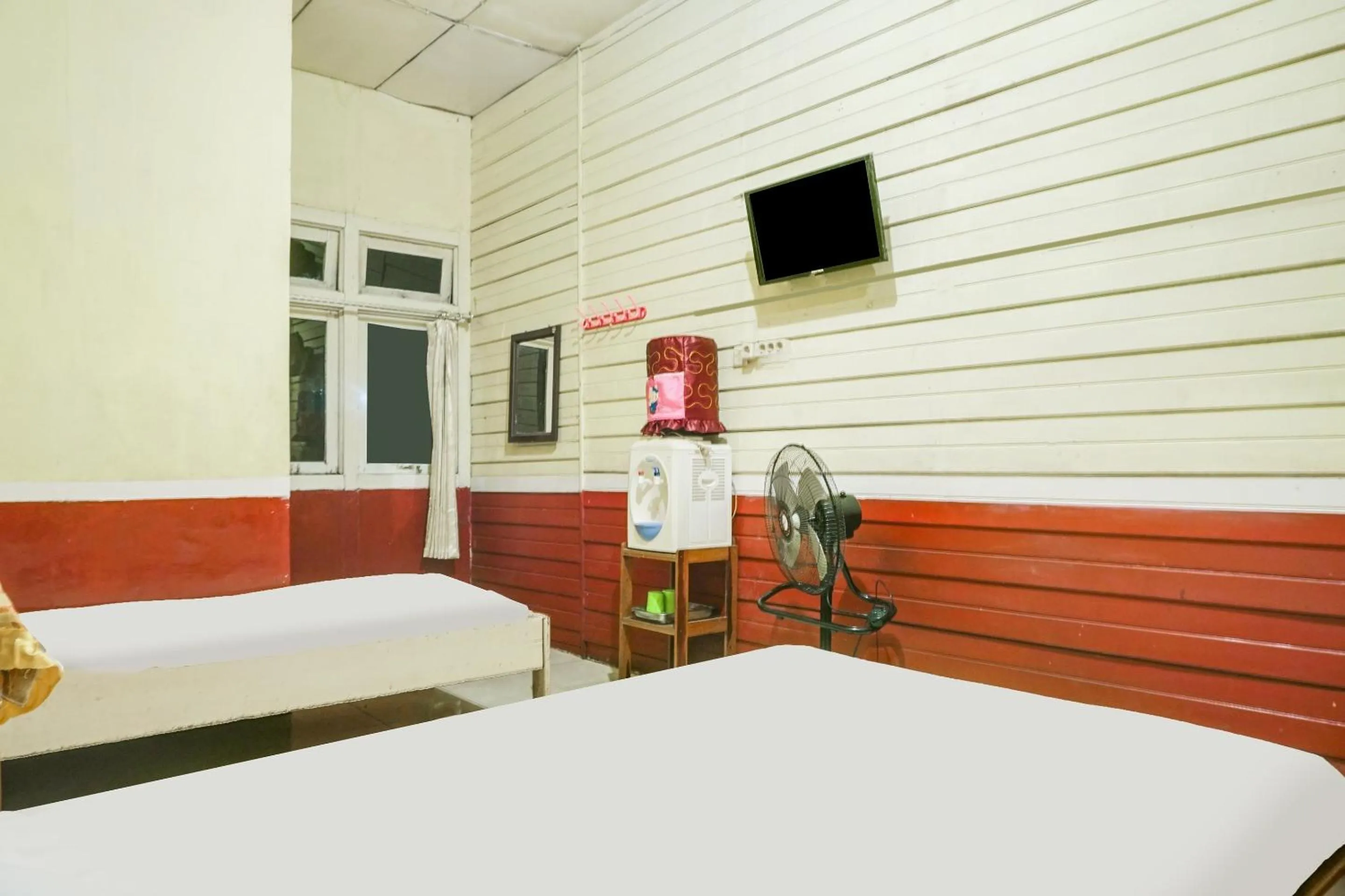 Bedroom in Hotel O Anggrek Daqu Syariah Kapuas