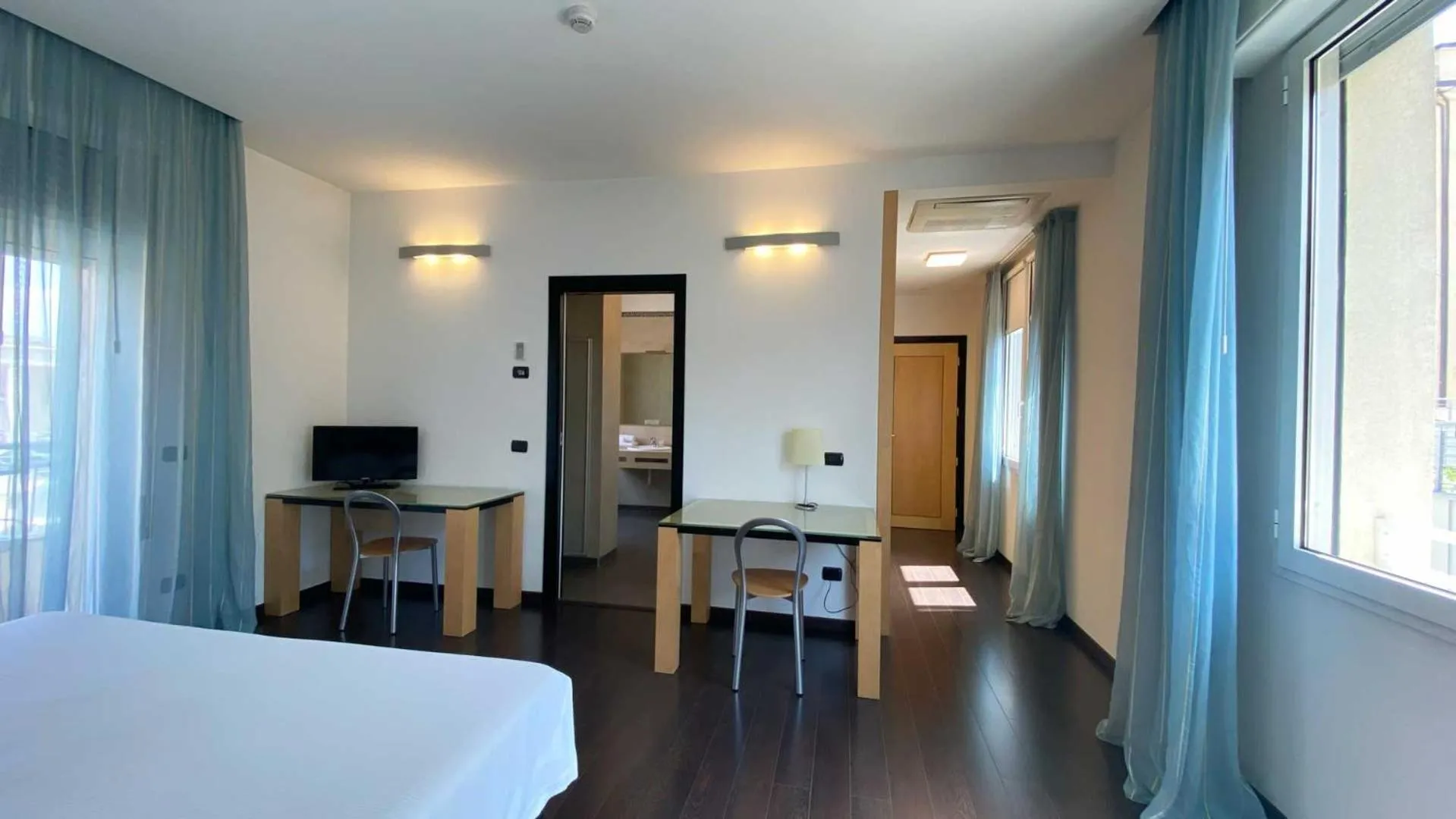 Bed in Luxury Rooms Padova Station