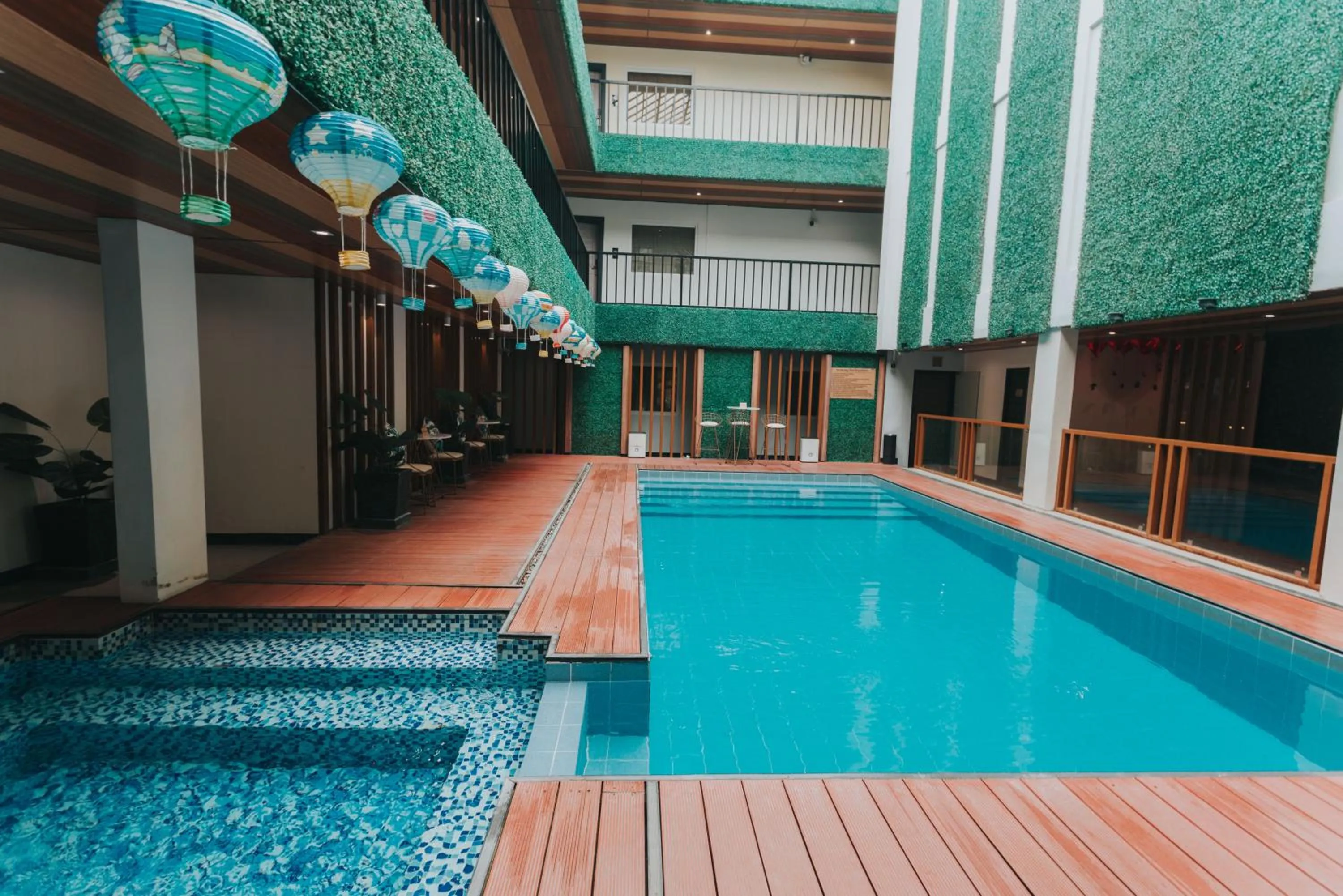 Swimming pool in SureStay Studio by Best Western Clarkview Angeles City