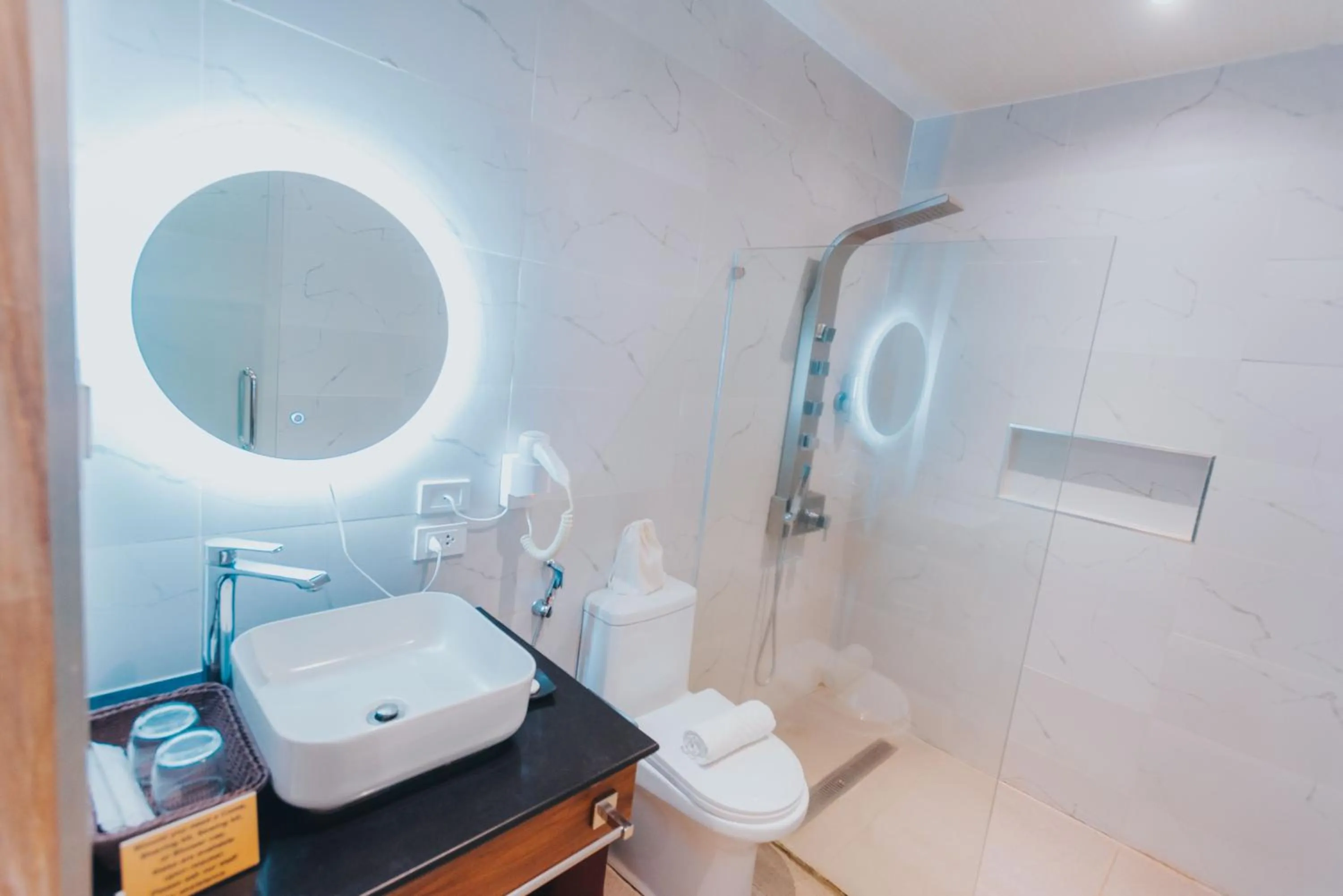 Bathroom in SureStay Studio by Best Western Clarkview Angeles City