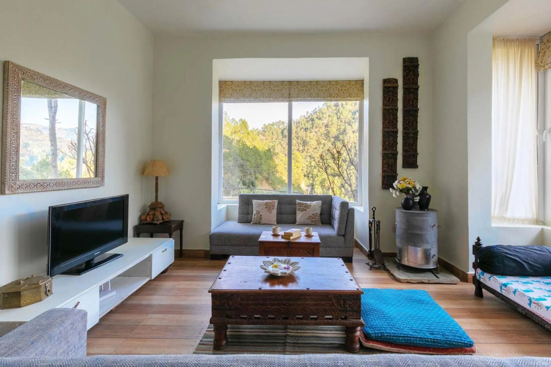 Living room in Hollyhock Cottage by VEO - Part of StayVista