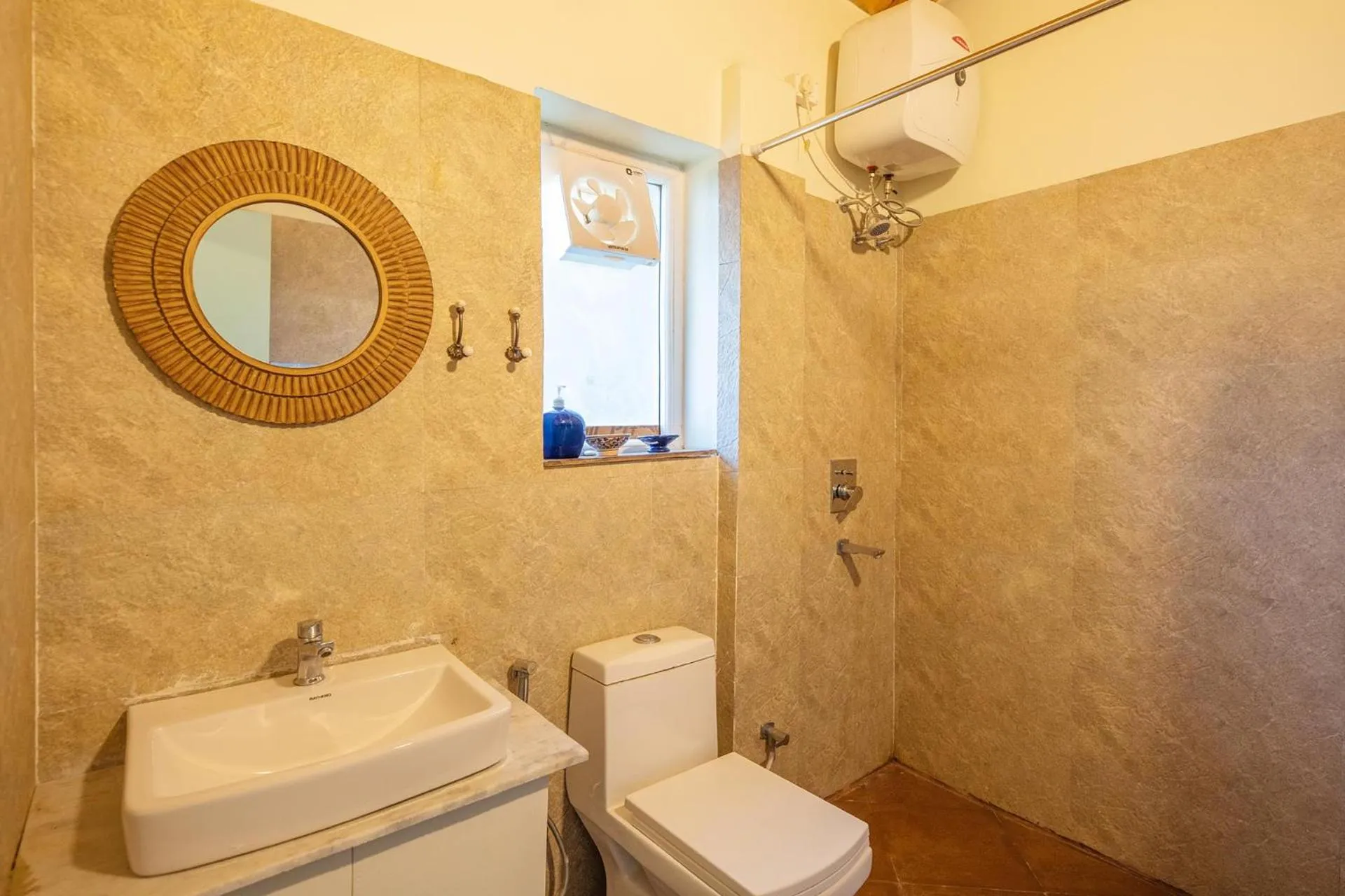 Bathroom in Hollyhock Cottage by VEO - Part of StayVista