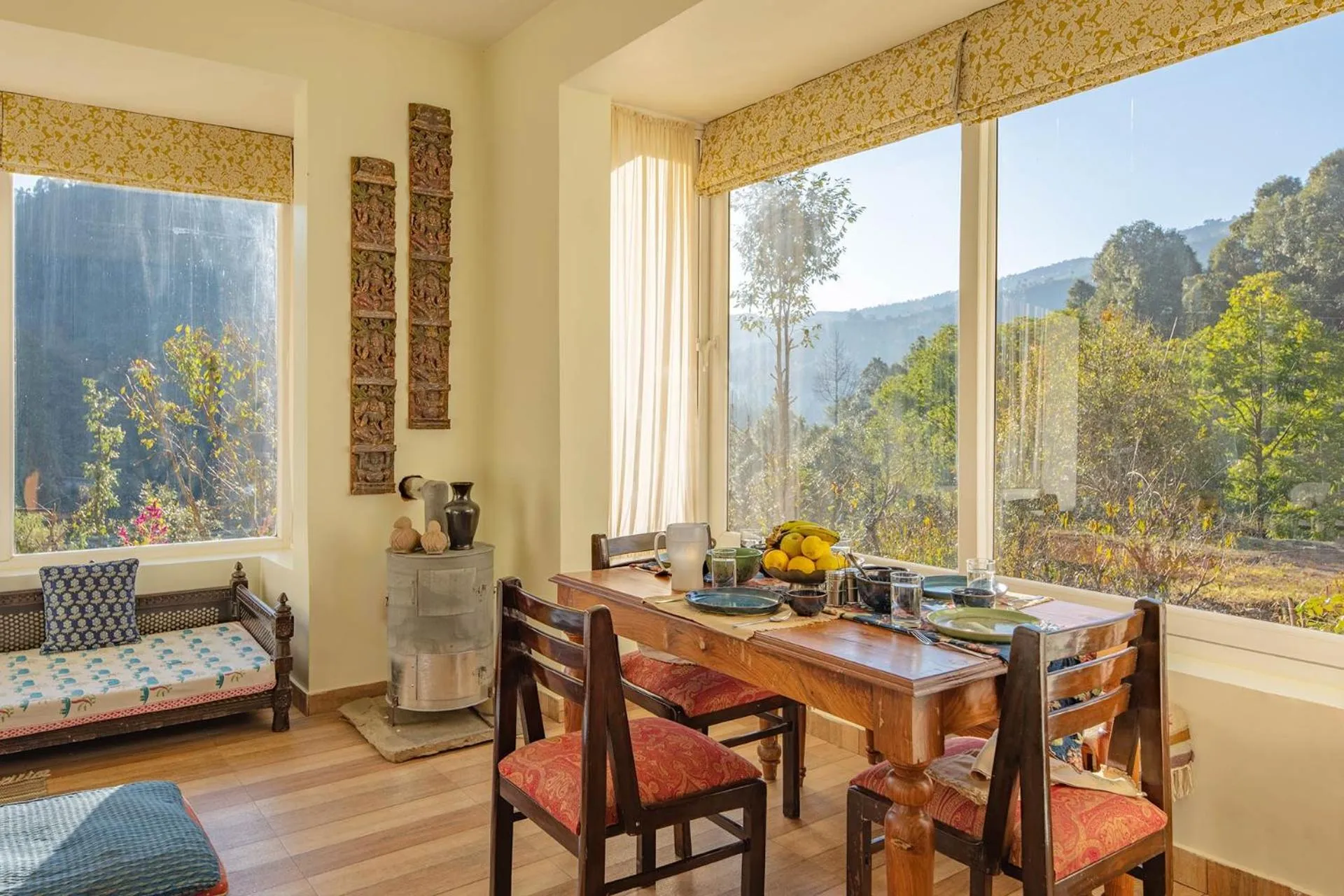 Dining area in Hollyhock Cottage by VEO - Part of StayVista