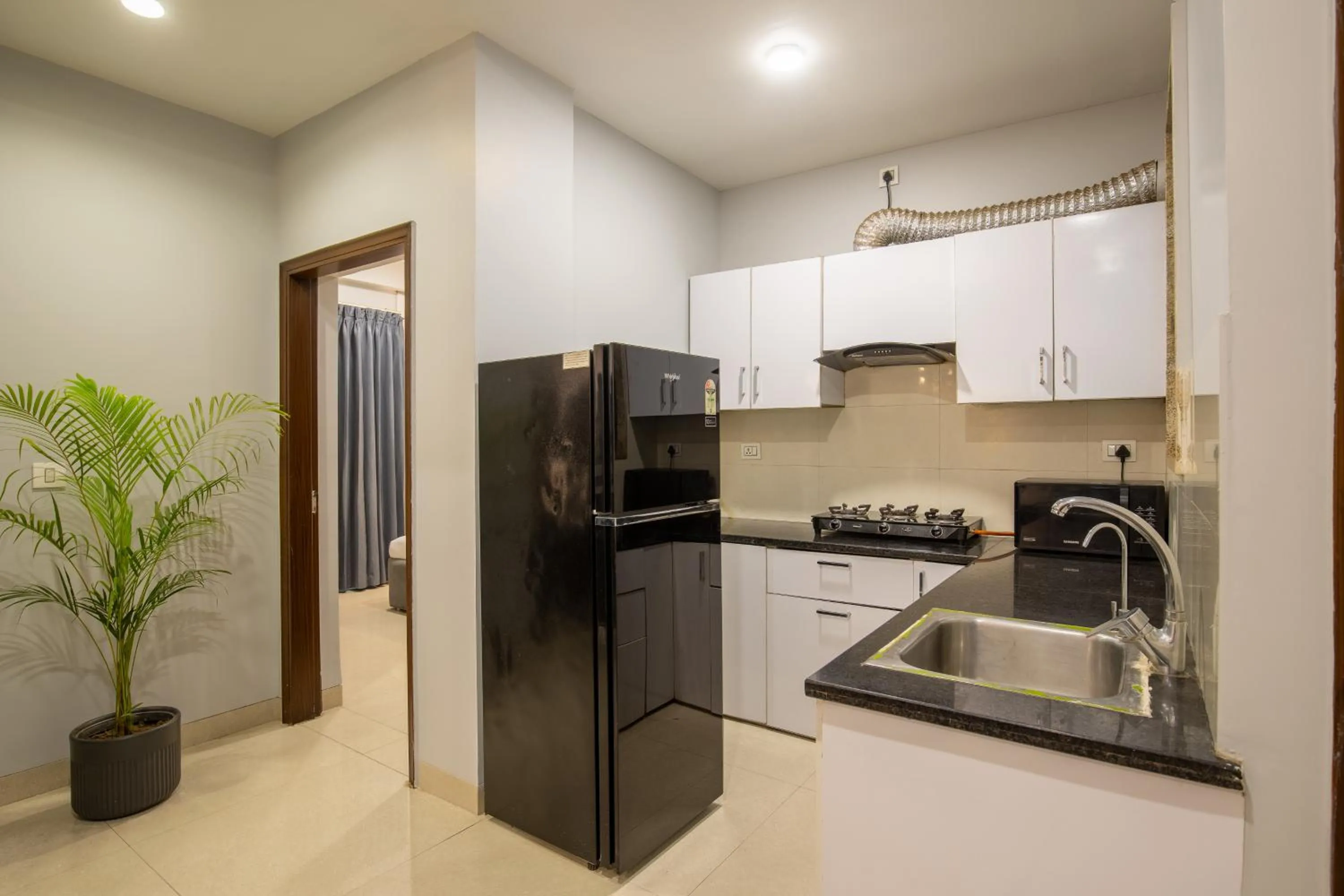 Kitchen or kitchenette in BedChambers Serviced Apartment, Medicity