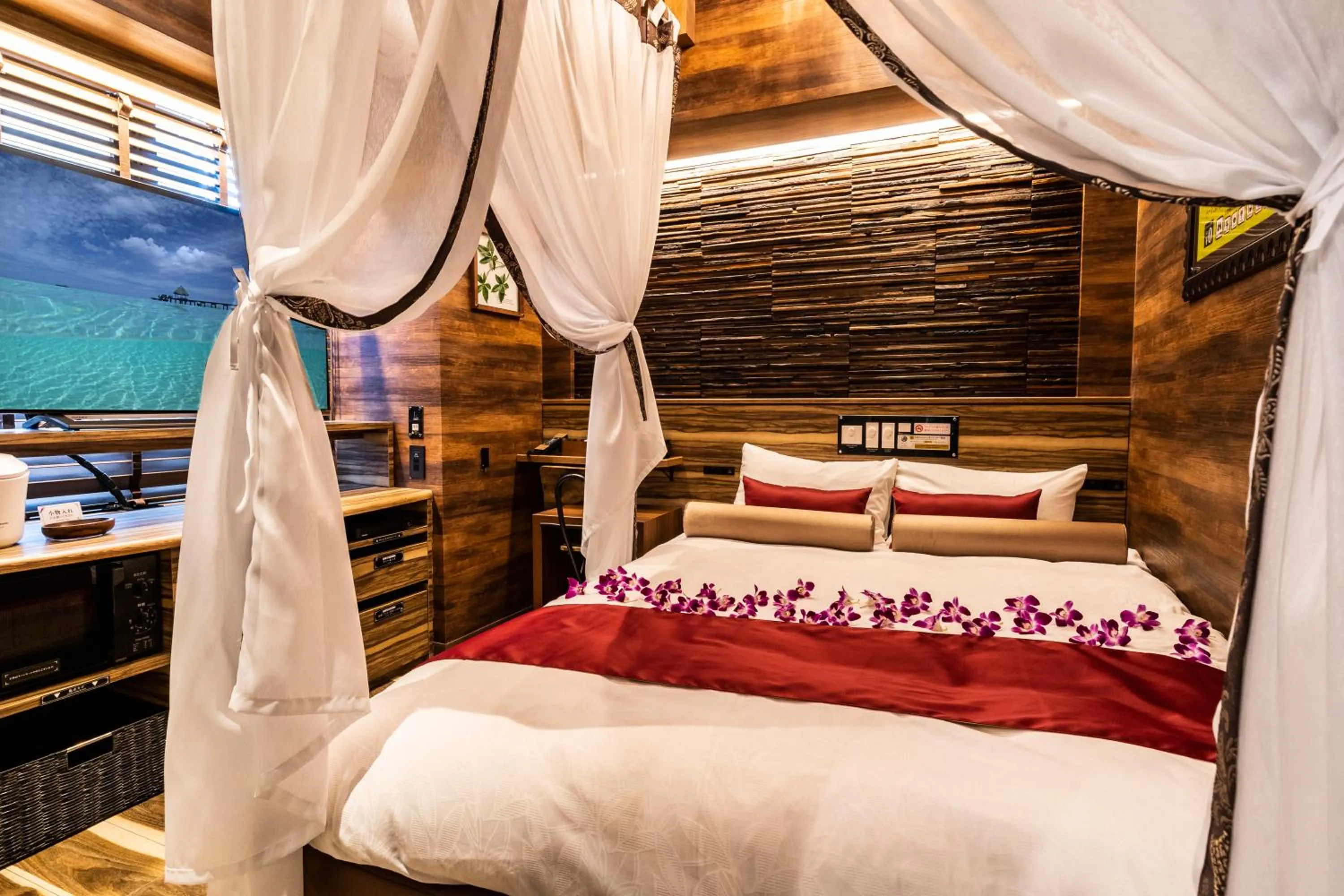 Bed in Petit Bali Forest Shinjuku Sanchōme