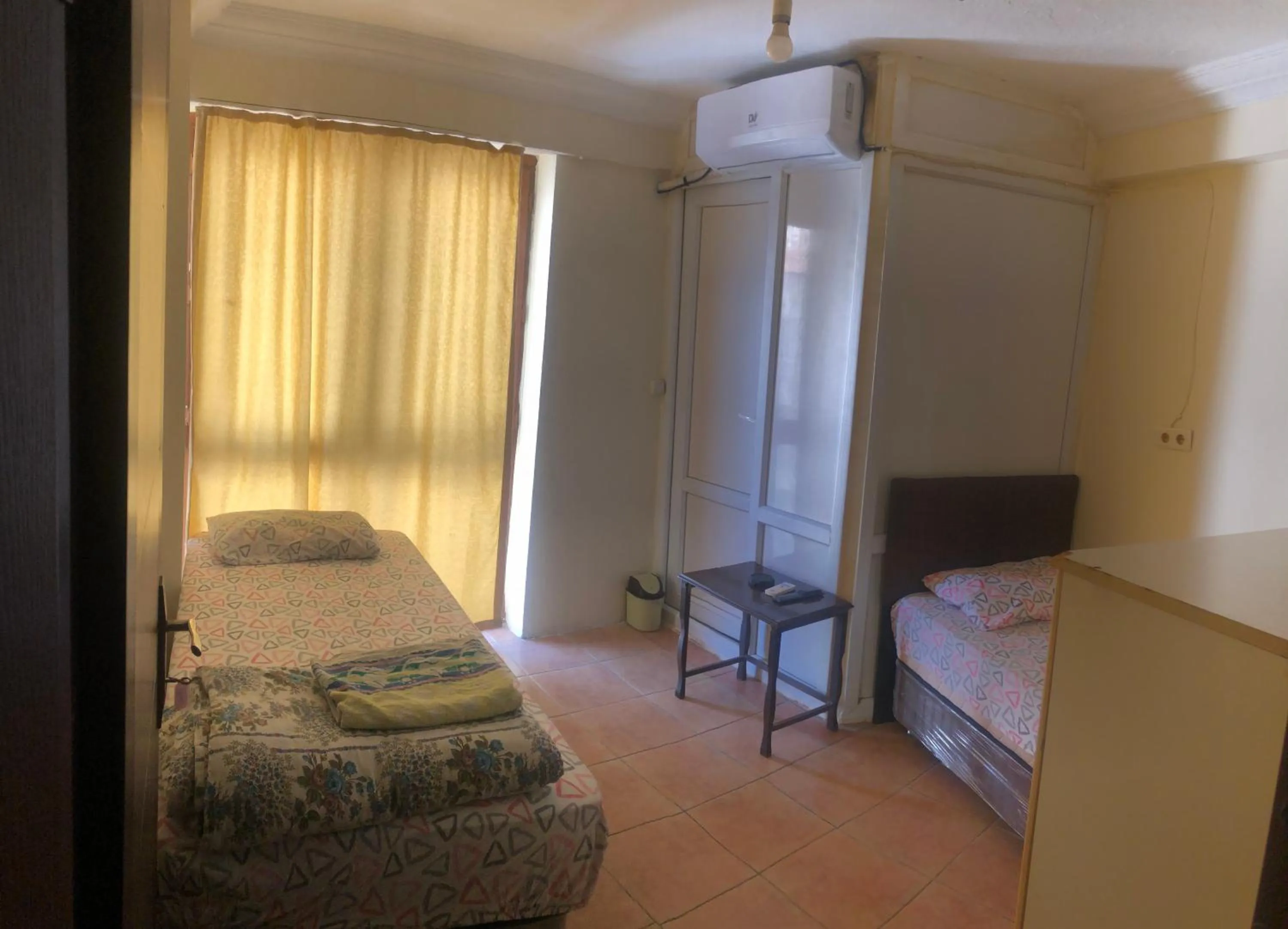 Photo of the whole room, Bed in DİZLEK PANSİYON