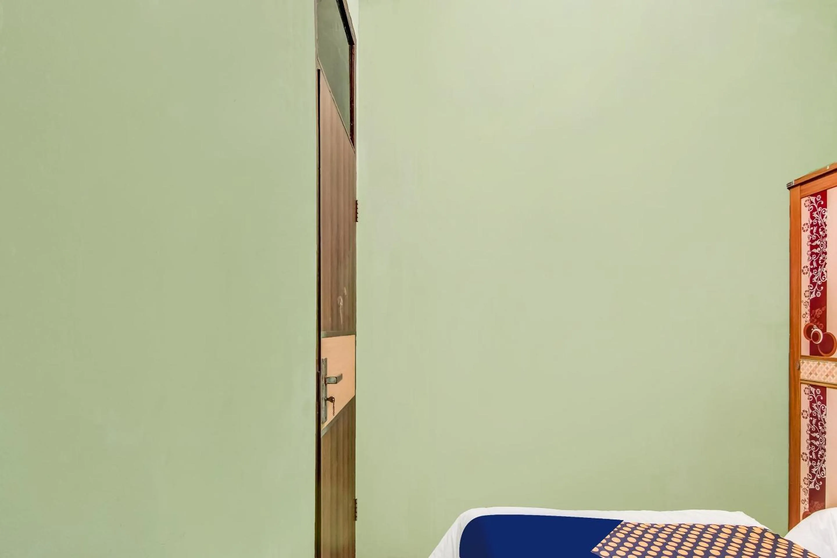 Bedroom in Hotel O Nayla Homestay Syariah Near Koro Koro Panam, Karaoke, Pool, & Cafe