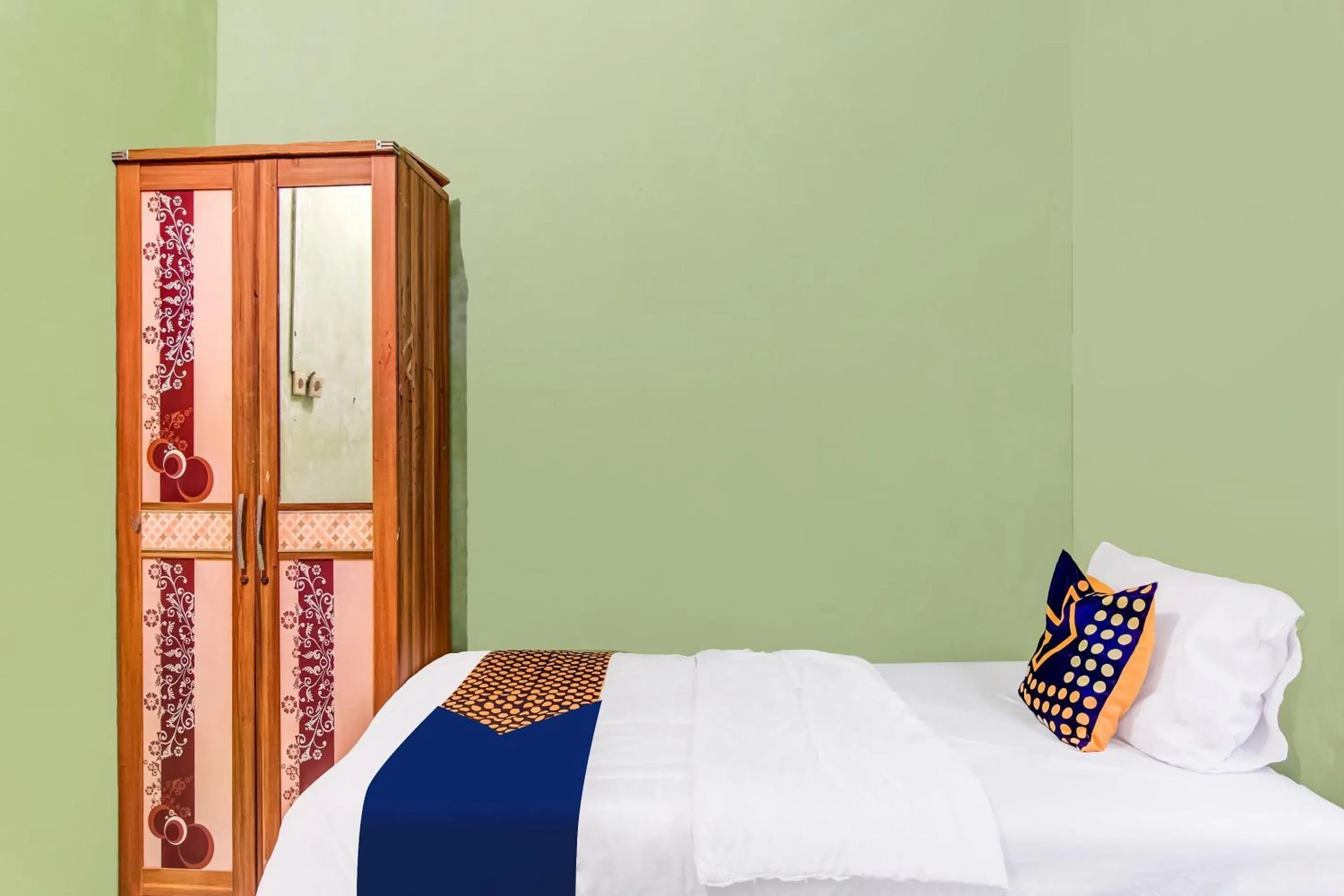 Bedroom in Hotel O Nayla Homestay Syariah Near Koro Koro Panam, Karaoke, Pool, & Cafe