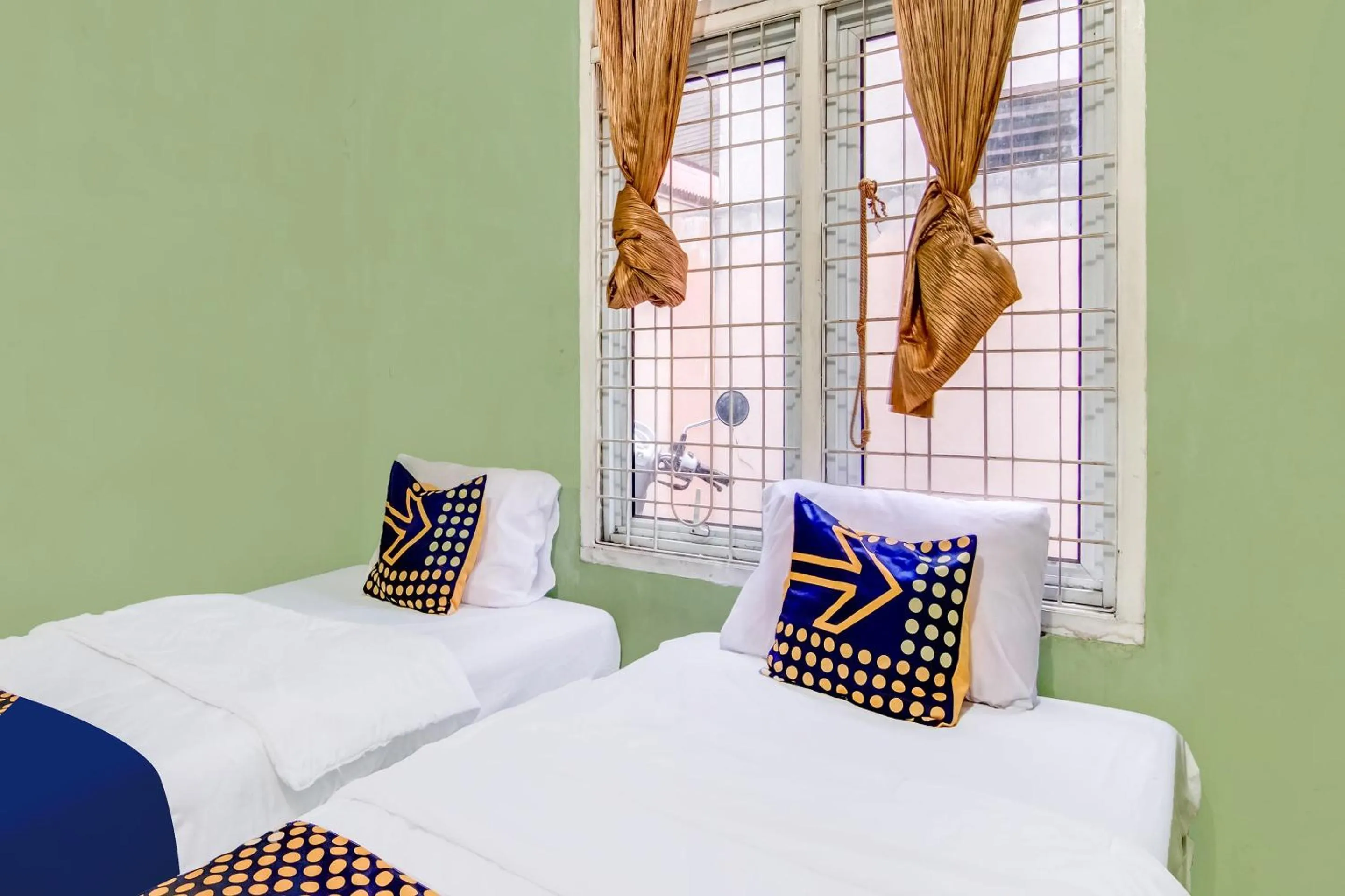 Bedroom in Hotel O Nayla Homestay Syariah Near Koro Koro Panam, Karaoke, Pool, & Cafe