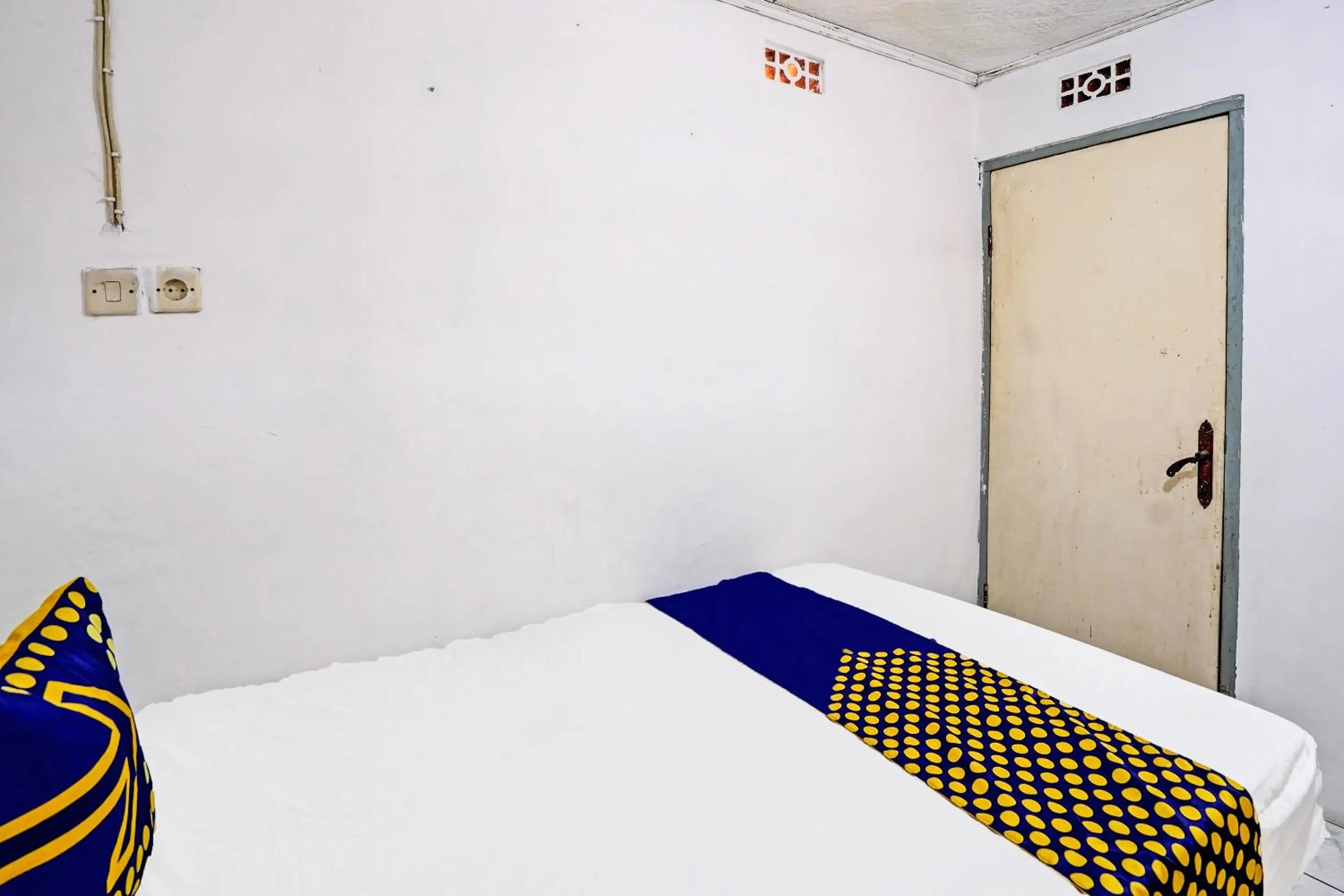 Bedroom, Bed in Hotel O Sidomulyo Kost Syariah