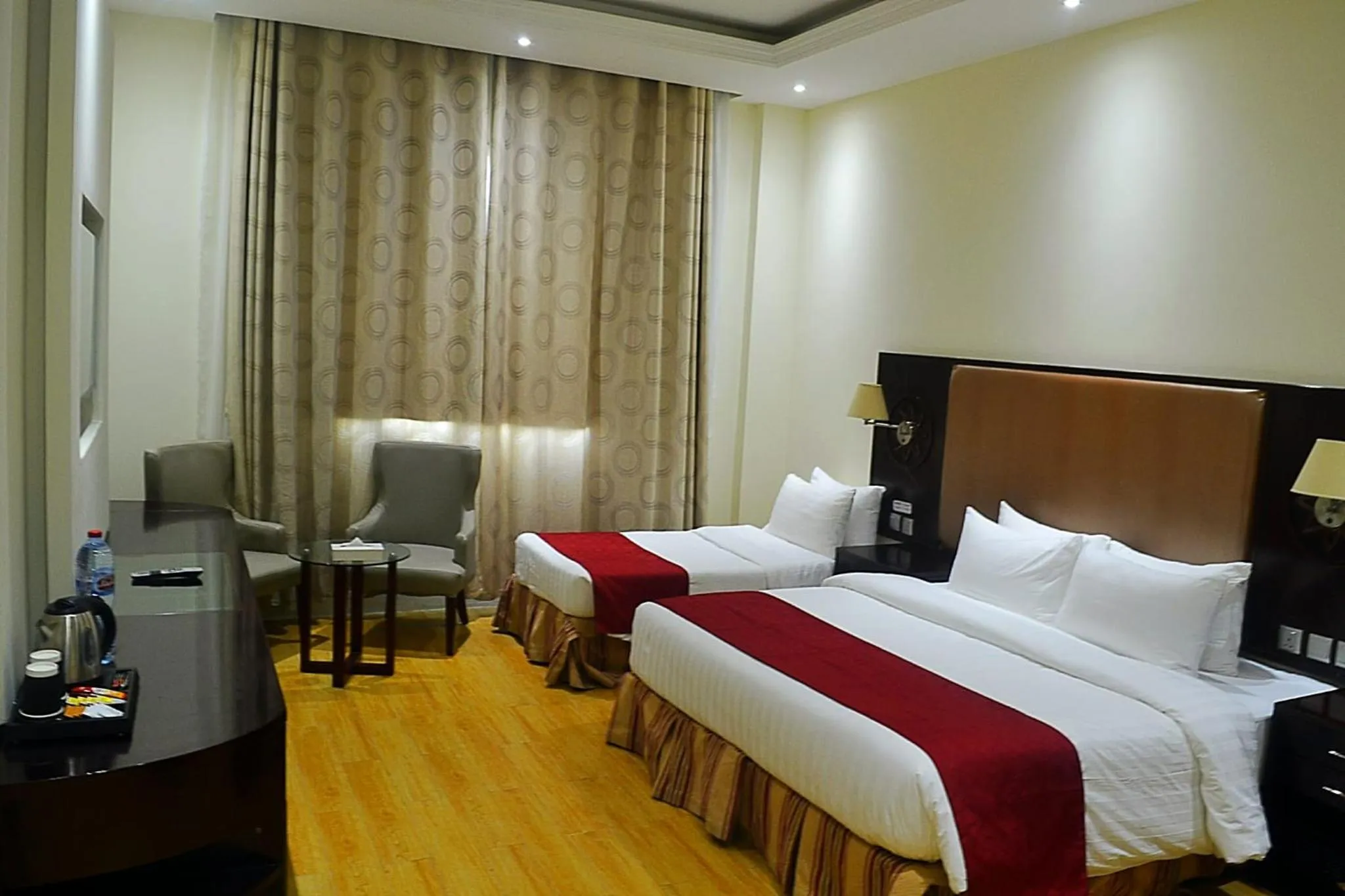 Bed in Palm Inn Hotel Doha