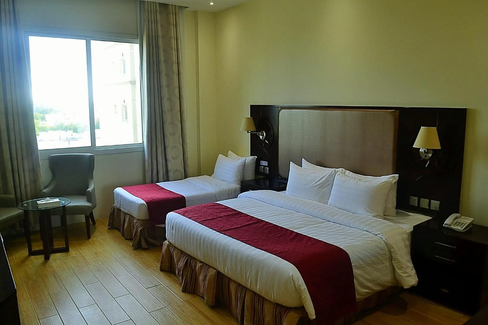 Bed in Palm Inn Hotel Doha