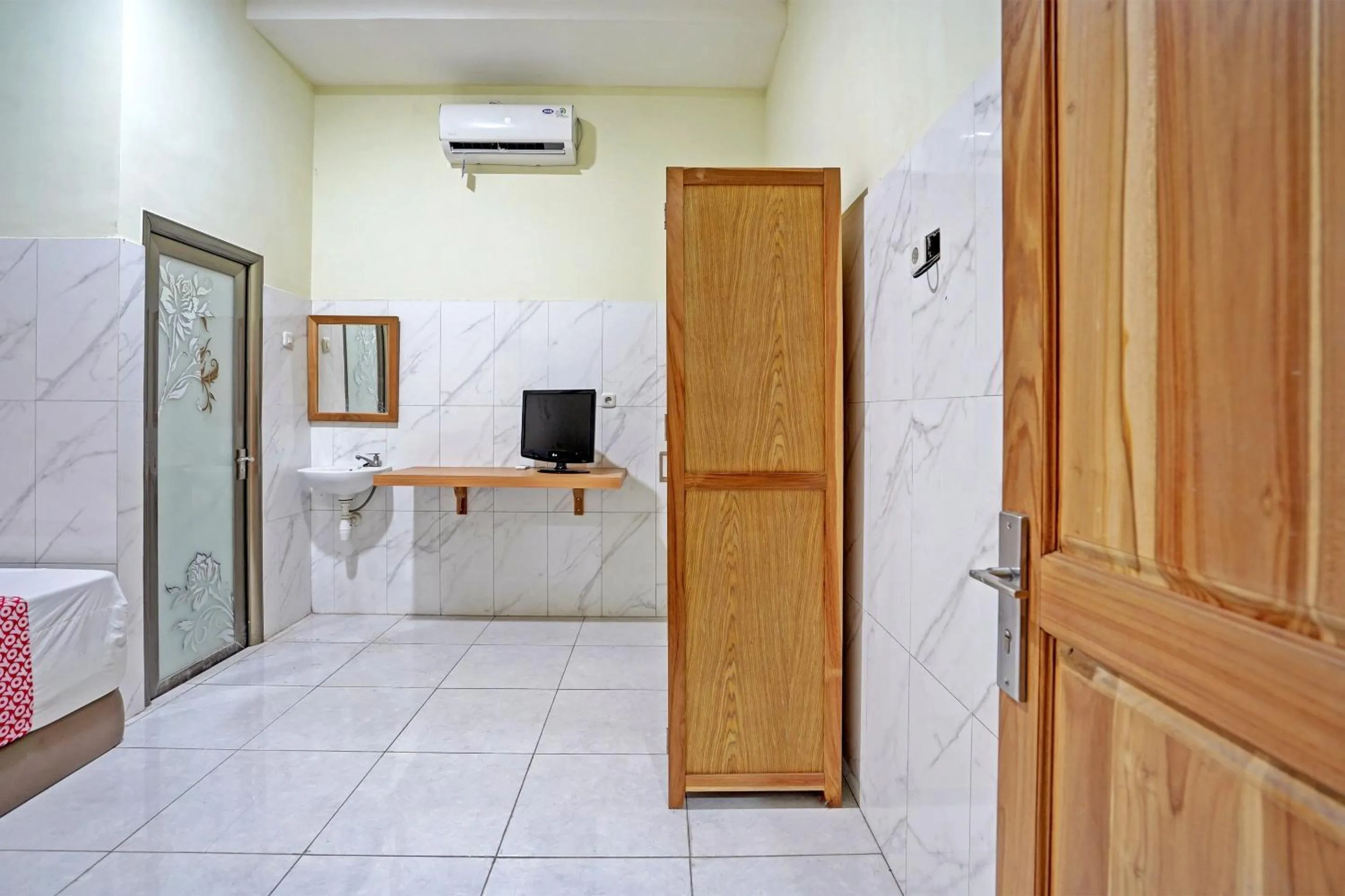 Bedroom in OYO Life 91884 Kost Kusuma Dewi Syariah