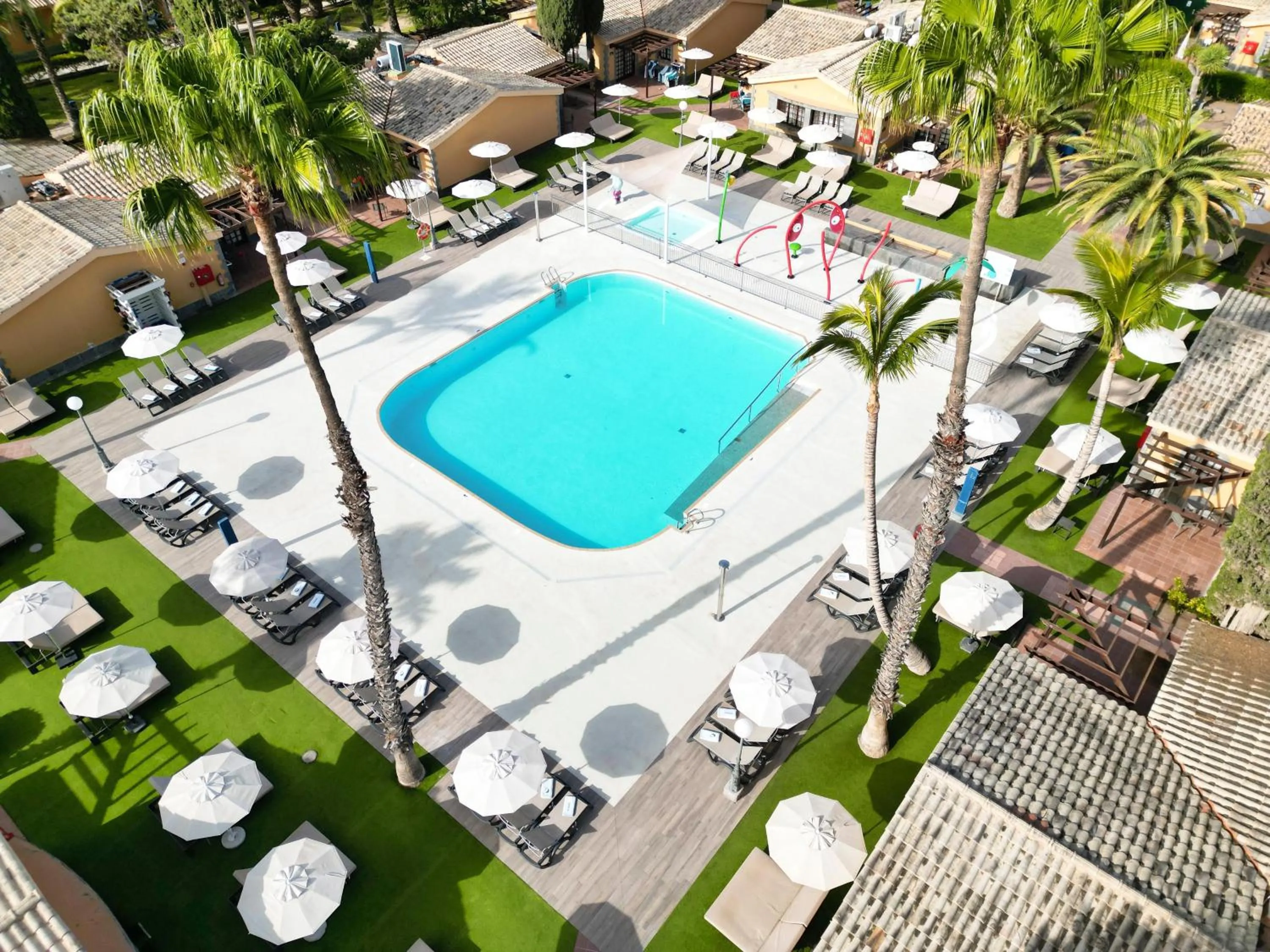 Swimming pool in Suites & Villas by Dunas