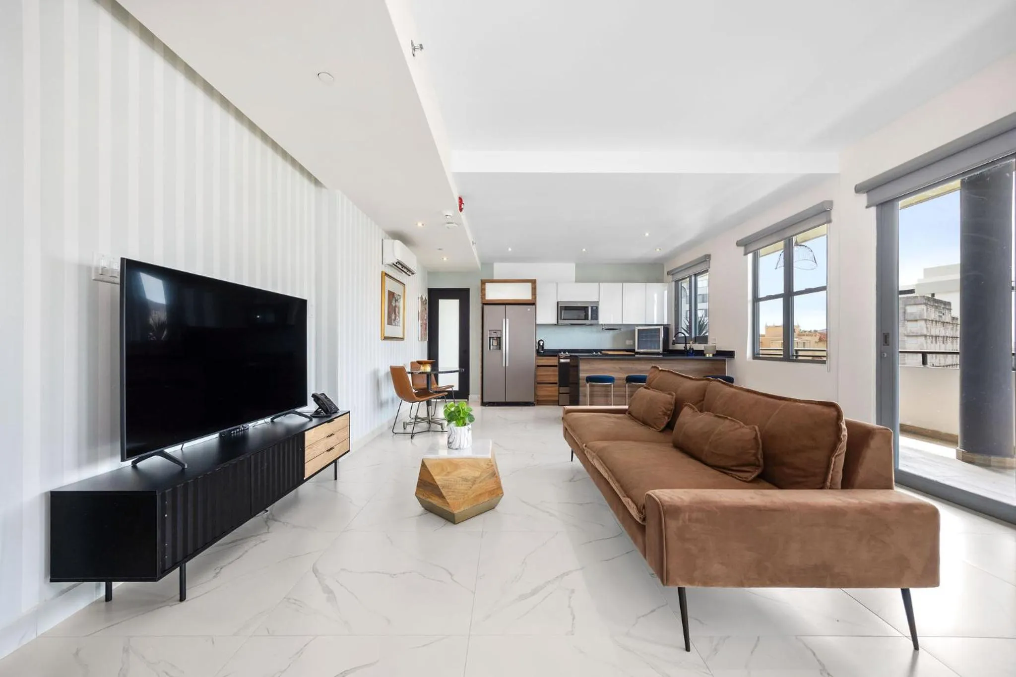 TV and multimedia in Don Rafa Boutique Hotel & Residences